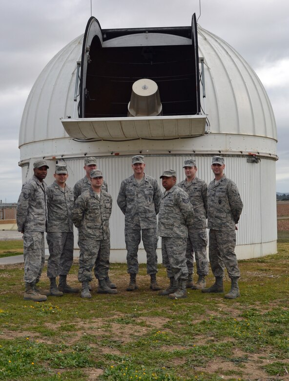 MORÒN AIR BASE, Spain - Col. Jeffrey Flewelling, 21st Space Wing vice commander (center), visited the 21st Operations Group Detachment 4, based at Moròn Air Base, Spain, Jan. 1, to get a first-hand look at how the unit contributes to U.S. Strategic Command’s space control mission of detecting, tracking and identifying all manmade deep-space objects. Detachment 4 is one of the 21st Space Wing’s 39 units, and operates the Moròn Optical Space Surveillance system, a telescope that detects and tracks earth-orbiting objects in deep space. It provides information on man-made objects in deep space, including satellites in geosynchronous and semisynchronous Earth orbit (U.S. Air Force photo/Tech. Sgt. Jeffrey Nash)