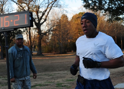Technical Sgt. Darius Roberson crosses the finish line first after completing the 2.5 mile run in honor of Martin Luther King Jr. Day at Joint Base Charleston – Air Base Jan. 13. More than 500 runners competed in the event. Roberson is assigned to the 437th Aircraft Maintenance Squadron. (U.S. Air Force photo/Staff Sgt. Katie Gieratz) 