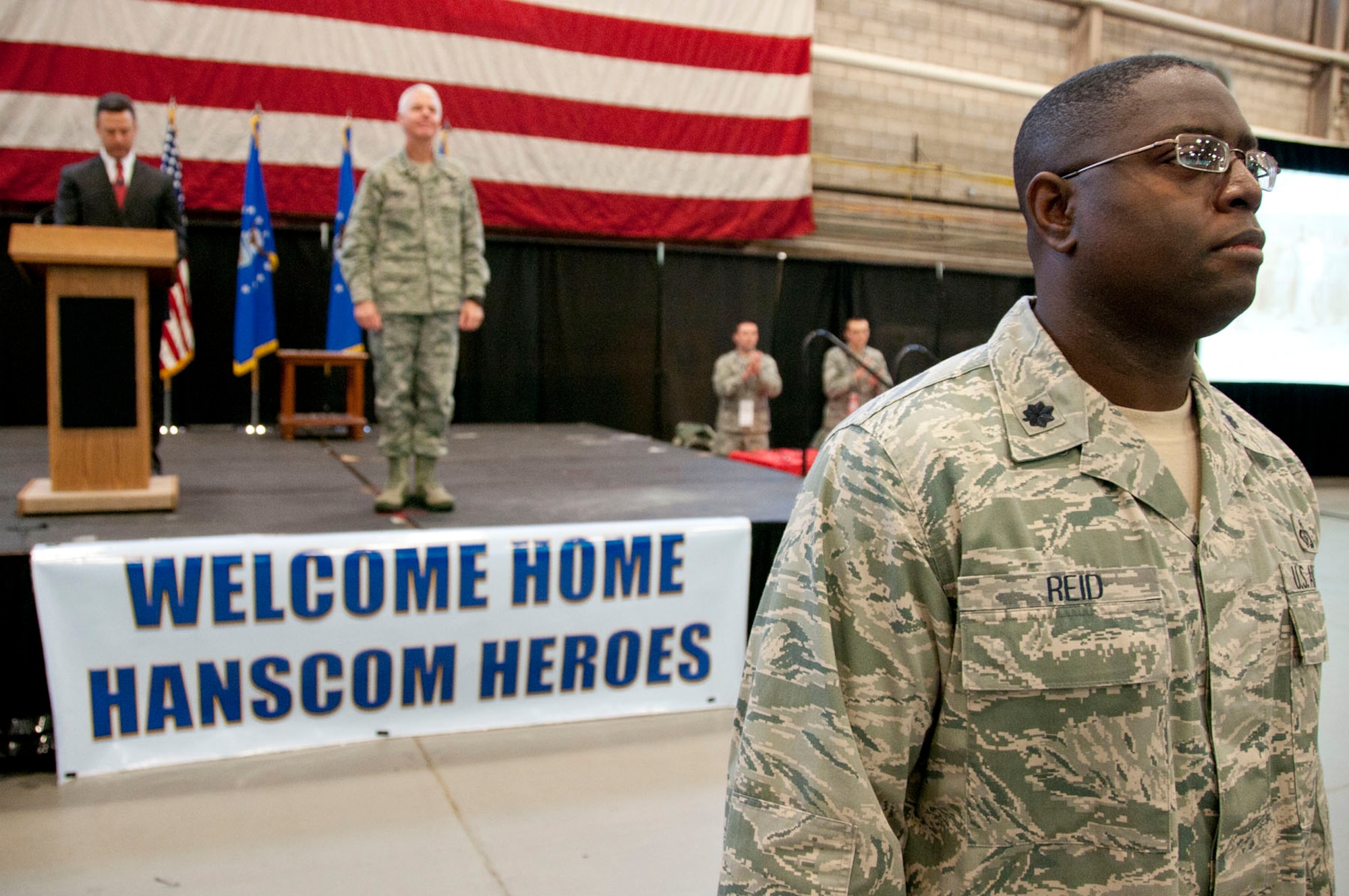HANSCOM AIR FORCE BASE, Mass. -- Lt. Col. Romero Reid, 66th Air Base Group deputy commander, serves as flight commander during a homecoming celebration Jan. 12. The event officially welcomed home 54 Airmen who have returned from a deployment during the past six months. They were honored along with their families during the Heroes’ Homecoming event. (U.S. Air Force photo by Mark Wyatt)