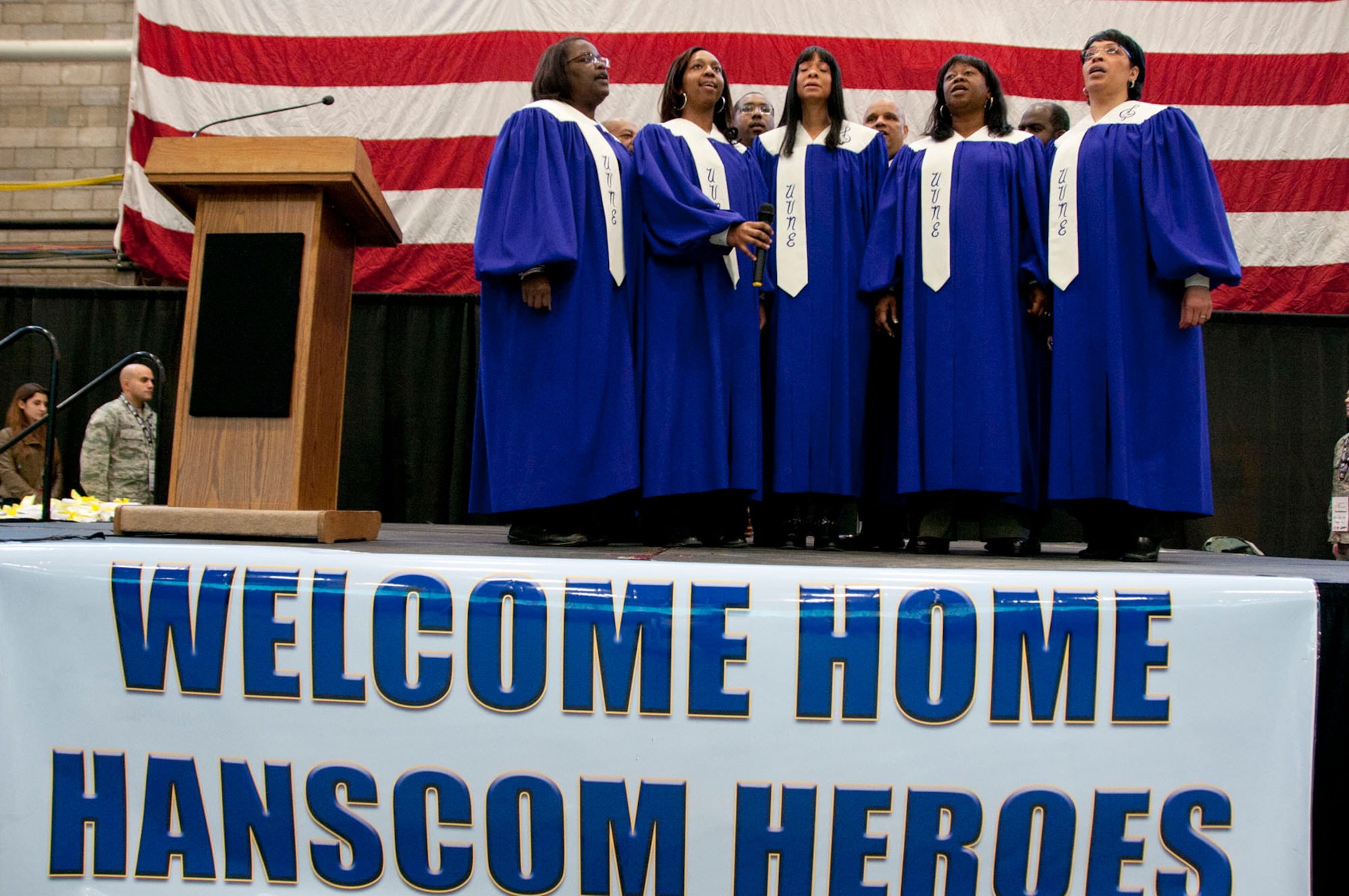 HANSCOM AIR FORCE BASE, Mass. – Unified Voices of New England sing the national anthem during a homecoming celebration Jan. 12. Fifty-four personnel assigned to the base who returned from deployments during the past six months were honored along with their families during the Heroes Homecoming event. (U.S. Air Force photo by Mark Wyatt)