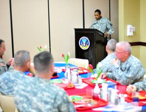SOTO CANO AB, Honduras ? Major Adrian Henderson, Joint Task Bravo ? Force staff judge advocate, gives the key note speech during the Dr. Martin Luther King, Jr. luncheon Jan. 12 at the dining facility in front of more than 50 servicemembers. The Dr. Martin Luther King, Jr., holiday was established in 1983 and was set to be on the third Monday of January to celebrate the civil-rights leader?s birthday Jan. 15. (Air Force photo/Staff Sgt. Bryan Franks)