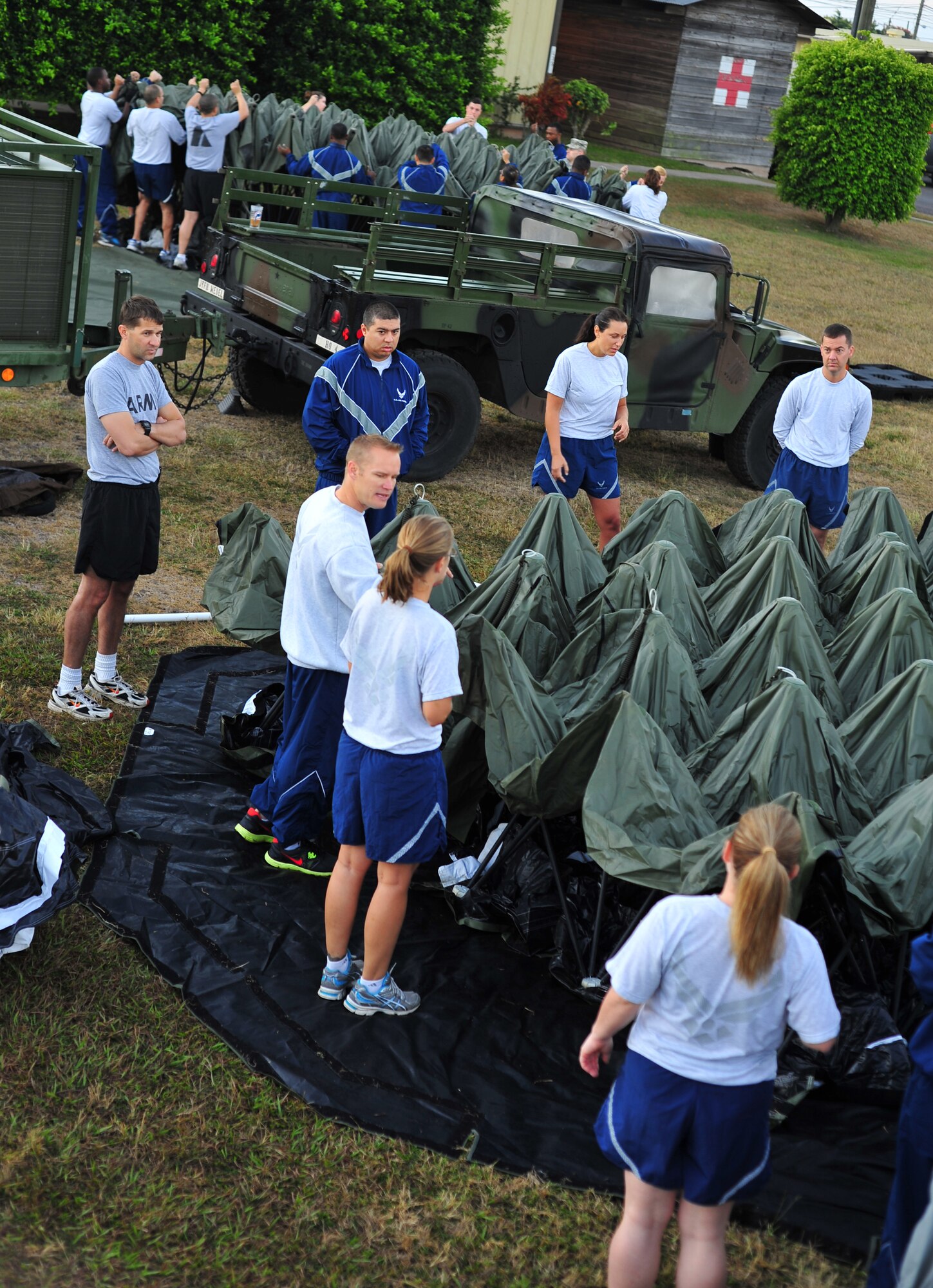 SOTO CANO AB, Honduras ? Medical Element personnel assigned at Joint Task Force-Bravo here, conduct an equipment familiarization exercise during their morning physical fitness session Jan. 6 here. The training was done to familiarize new personnel who recently arrived with MEDEL?s equipment and as a teambuilding exercise. (Air Force photo/Staff Sgt. Bryan Franks)