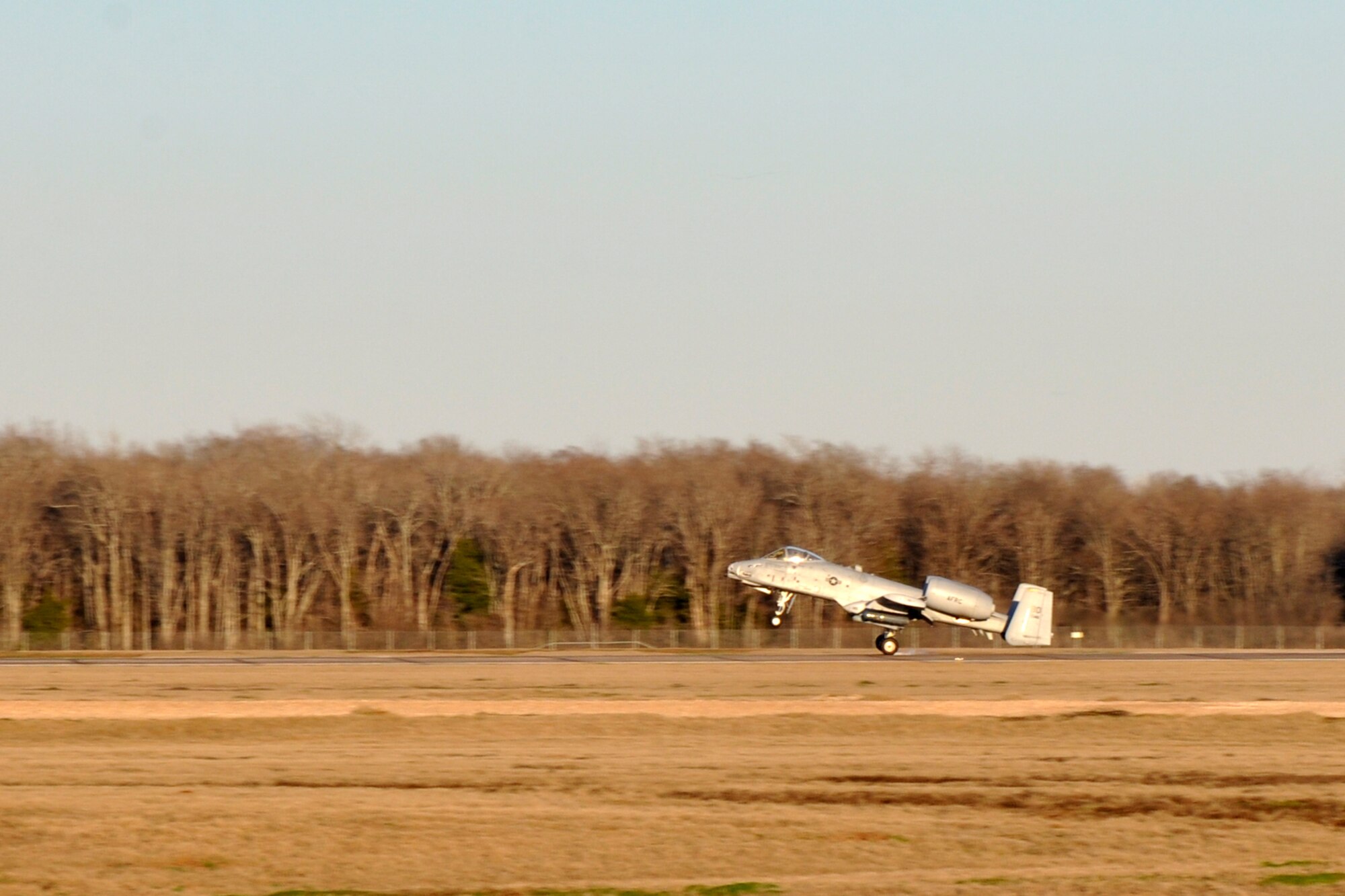 Lt. Col. Marc Olson, an A-10 pilot assigned to the 47th Fighter Squadron, touches down on the runway in an A-10 Thunderbolt II at Barksdale Air Force Base, La., Jan. 11, 2012. Olson had just returned from a four-ship sortie, and in doing so accumulated 5,000 hours in the A-10. To complete this feat took Olson more than twenty and a half years of flying the A-10. (U.S. Air Force photo by Master Sgt. Jeff Walston/Released)