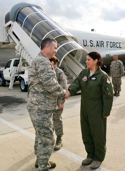 Col. Mitchel Butikofer, 78th Air Base Wing (ABW) commander, left, greets Maj. Iris Critten, 461st Air Control Wing (ACW), prior to boarding the E-8 Joint STARS aircraft, Robins Air Force Base, Ga., Jan. 09, 2012.  Butikofer and other members of the 78th ABW leadership toured the aircraft during an immersion tour of the 461st ACW.  (Air National Guard photo by Master Sgt. Roger Parsons/Released)