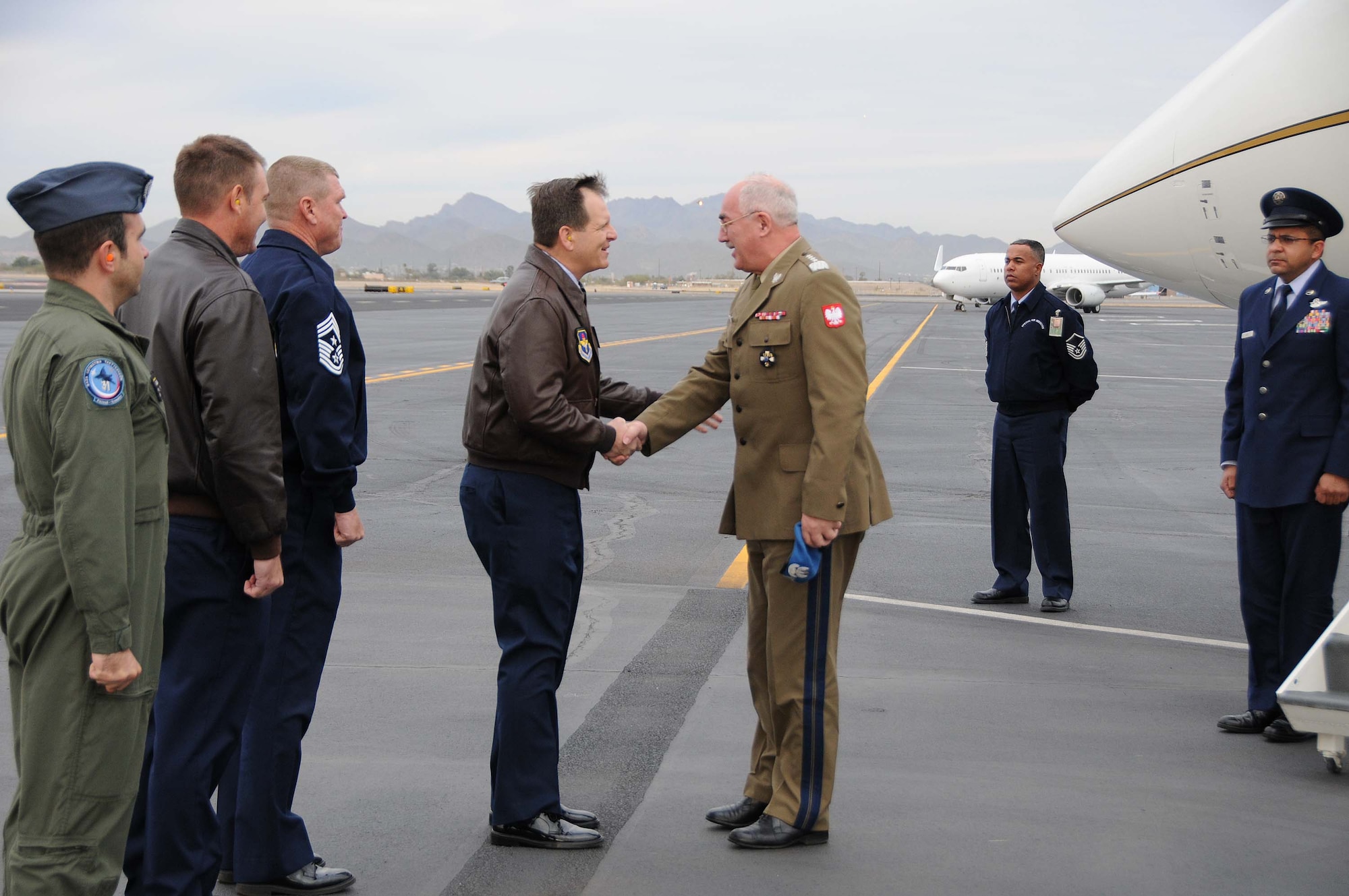 Polish Army Gen. Mieczyslaw Cieniuch (right), Chief of the General Staff of the Polish Armed Forces, is greeted at Tucson International Airport by Col. Mick McGuire, 162nd Fighter Wing commander, upon his arrival Jan. 12. (U.S. Air Force photo/Master Sgt. Dave Neve)
