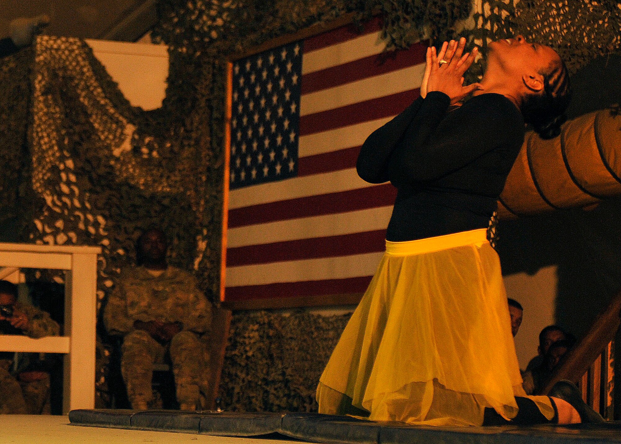 BAGRAM AIRFIELD, Afghanistan— A performer executes a dance routine during the Dr. Martin Luther King, Jr. Remembrance Ceremony at Bagram Airfield, Afghanistan Jan. 16, 2012. The ceremony also featured several other performances and speeches designed to honor Dr. King’s life and ideals. (U.S. Air Force photo/ Airman 1st Class Ericka Engblom)