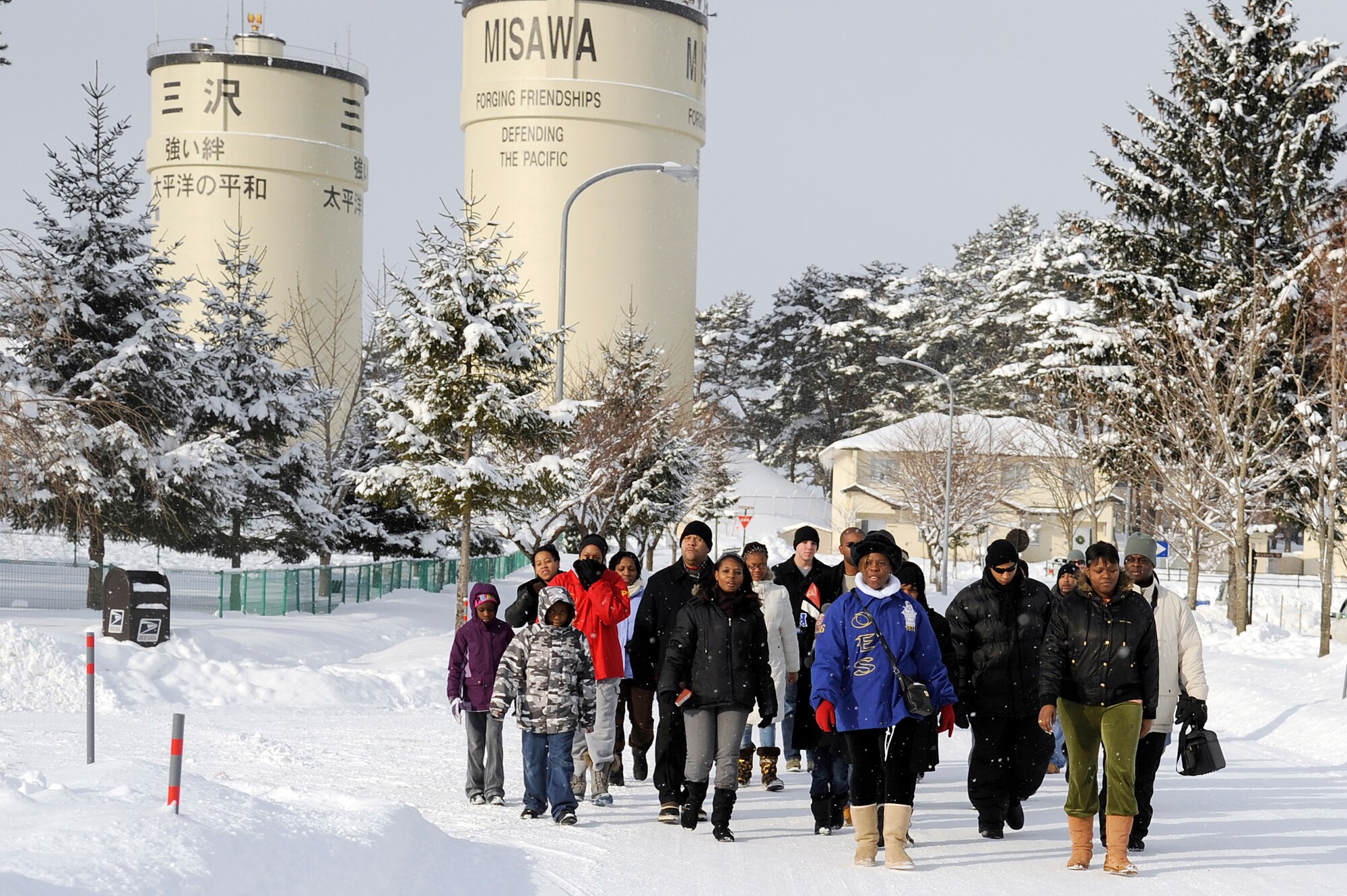 MISAWA AIR BASE, Japan - Members of the Misawa community march from Risner Circle to the base chapel to honor Martin Luther King Jr. here, Jan. 16. This year marks the 26th anniversary of the federal holiday recognizing Martin Luther King Jr. (U.S. Air Force photo/Tech. Sgt. Marie Brown)
