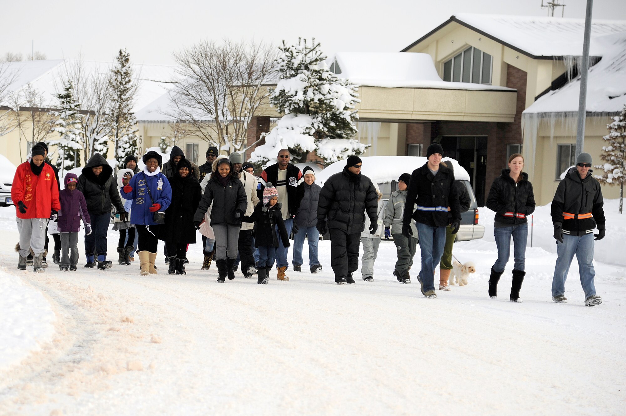MISAWA AIR BASE, Japan - Members of the Misawa community come together to remember Martin Luther King Jr. during a march from Risner Circle to the base chapel here, Jan. 16. While the first official federal holiday was observed in 1986, Illinois was the first state to adopt Martin Luther King Jr. Day as a state holiday in 1973. (U.S. Air Force photo/Tech. Sgt. Marie Brown)