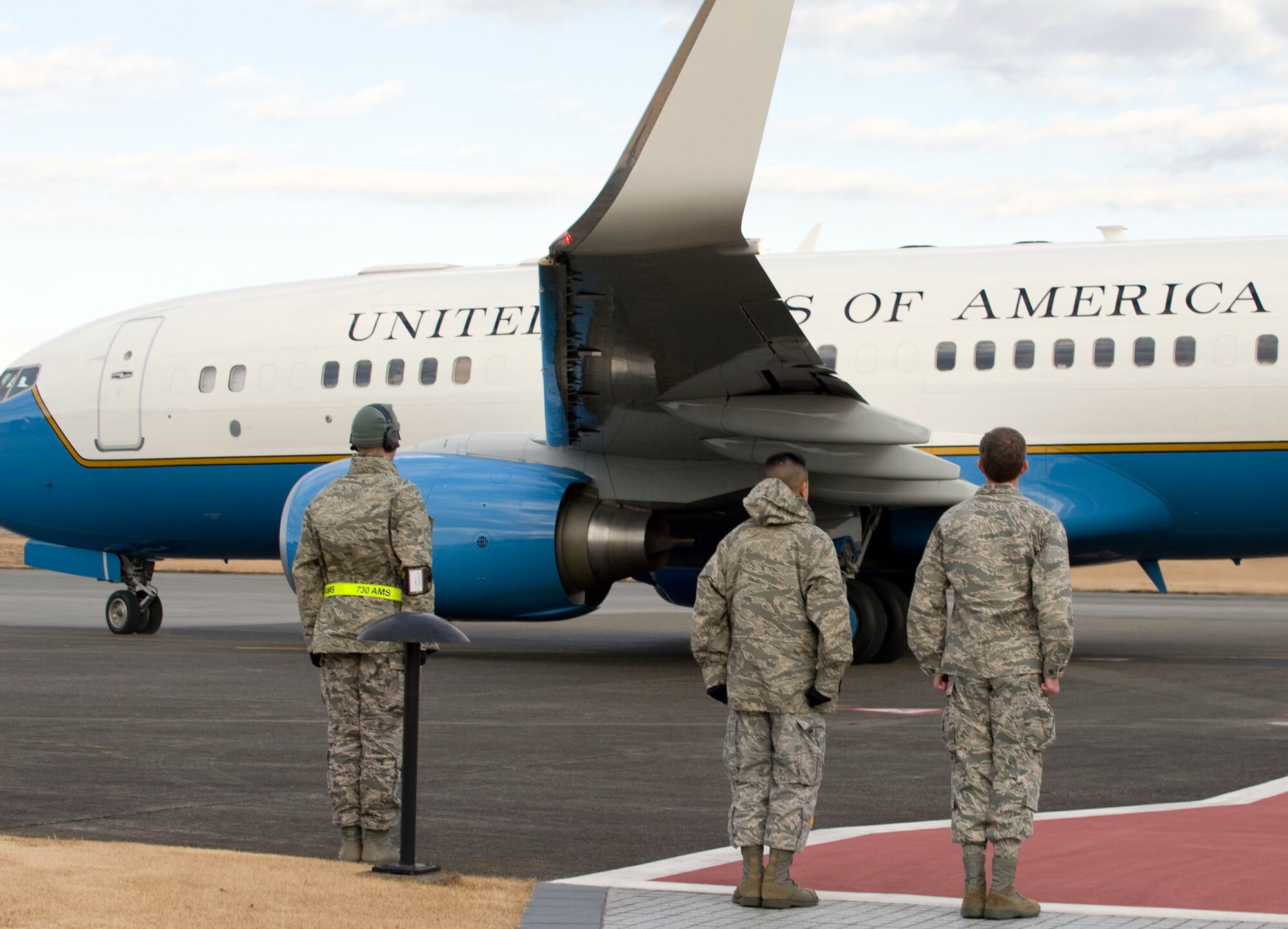 YOKOTA AIR BASE, Japan -- Airmen stand at attention as Honorable Tim Geithner, Secretary of Treasury, departs from Yokota Air Base, Japan, Jan. 12, 2012. Geithner visited Japan to discuss economic topics with Japanese government. (U.S. Air Force photo/Airman 1st Class Krystal M. Garrett) 
 
