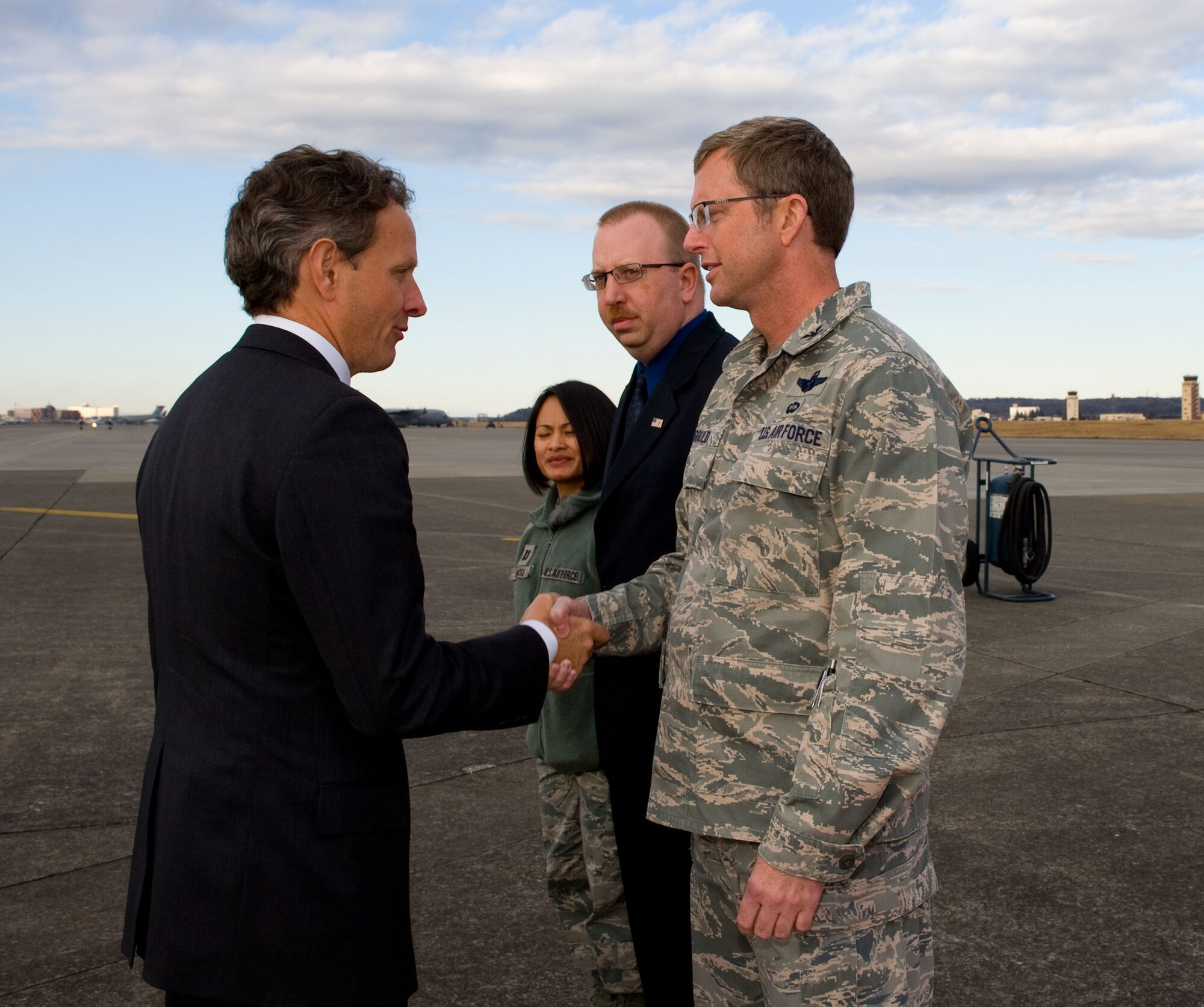YOKOTA AIR BASE, Japan -- Col. David Gould, 374th Operations Group commander, greets Honorable Tim Geithner, Secretary of Treasury, at Yokota Air Base, Japan, Jan. 12, 2012. . Geithner visited Japan to discuss economic topics with Japanese government. (U.S. Air Force photo/Airman 1st Class Krystal M. Garrett) 

