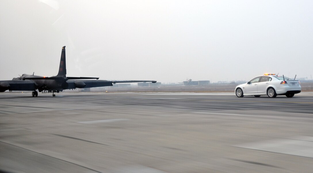 Maj. Carl Maymi, 5th Reconnaissance Squadron U-2 pilot, chases the U-2 “Dragon Lady” down the flightline at speeds of more than 100 mph in the chase car at Osan Air Base, Republic of Korea, Jan. 12, 2012. (U.S. Air Force photo/Airman 1st Class Michael Battles)