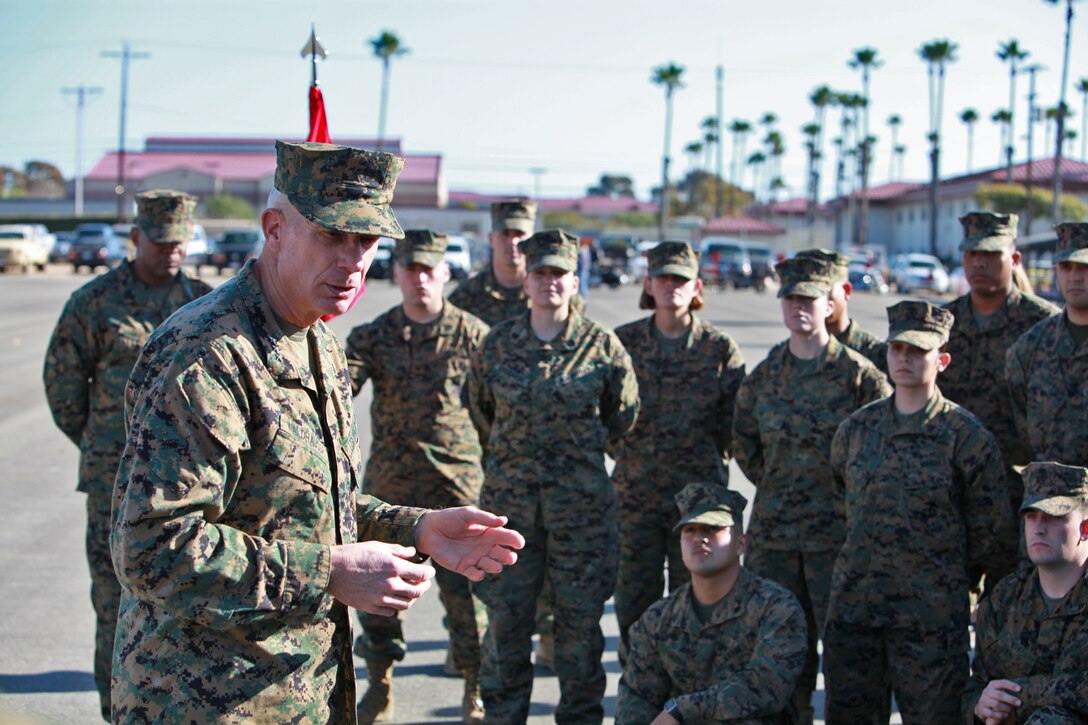 Lieutenant Gen. Thomas D. Waldhauser, commanding general, I Marine Expeditionary Force, talks to the Marines and sailors of the 15th Marine Expeditionary Unit, Jan. 17, on the Camp Del Mar Parade Deck, explaining the significance of the unit’s accomplishment on their last deployment,. The Admiral Flatley award is awarded each year to one aircraft carrier and amphibious ship, along with its embarked air wing and MEU.