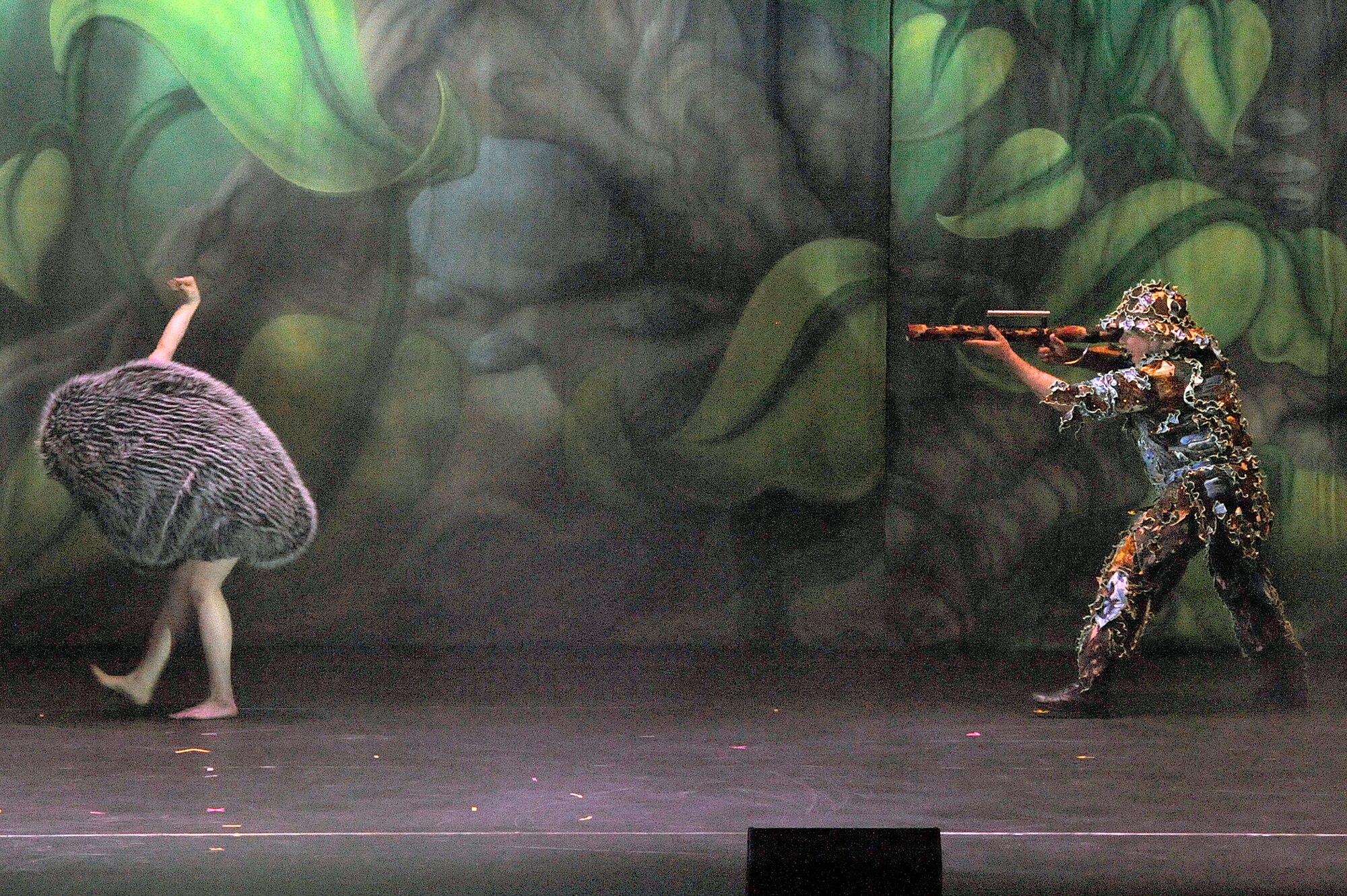 MISAWA CITY, Japan - Performers dressed in nature costumes kick off the Cirque Dreams Jungle Fantasy World Tour show at the Misawa Civic Center in Misawa City Jan 18. Cirque Dreams Jungle Fantasy is an exotic encounter inspired by nature's unpredictable creations that are brought to life by an international cast of soaring aerialists, spine-bending contortionists, acrobats, jugglers and musicians. (U.S. Air Force photo/Tech. Sgt. Marie Brown)