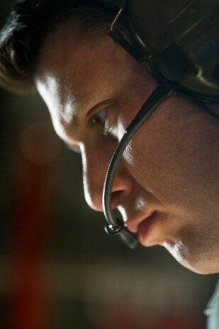 A U.S. Air Force pararescueman, 58th Rescue Squadron, prepares to conduct a military static-line jump mission Jan. 10, 2012, at Nellis Air Force Base, Nev. Pararescuemen are trained to provide emergency medical treatment in adverse terrain and conditions in combat or peacetime. (U.S. Air Force photo by Airman 1st Class Daniel Hughes/Released)
