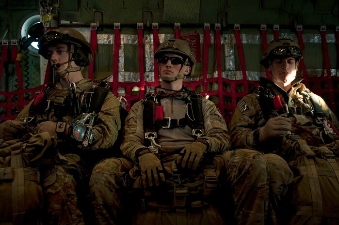 U.S. Air Force pararescuemen, 58th Rescue Squadron, wait to reach a designated drop zone on a C-130 Hercules, Air National Guard, Long Island, NY, during a military static-line jump mission Jan. 13, 2012, at Nellis Air Force Base, Nev. Pararescuemen are trained to provide emergency medical treatment in adverse terrain and conditions in combat or peacetime. (U.S. Air Force photo by Staff Sgt. Christopher Hubenthal/Released)

