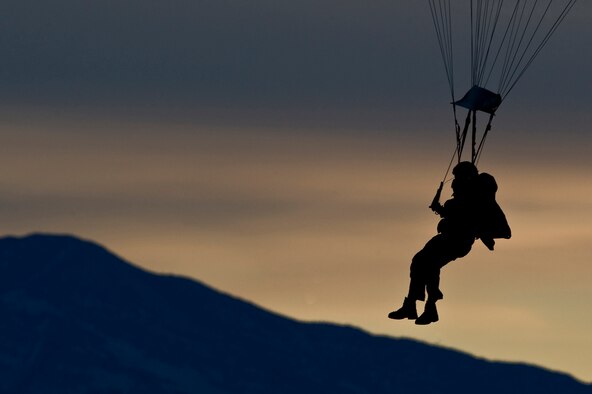 A U.S. Air Force pararescueman, 58th Rescue Squadron, perpares to land during a military freefall jump Jan. 11, 2012, at Wendover Field, Utah. Pararescuemen are trained to provide emergency medical treatment in adverse terrain and conditions in combat or peacetime. (U.S. Air Force photo by Airman 1st Class Daniel Hughes/Released)
