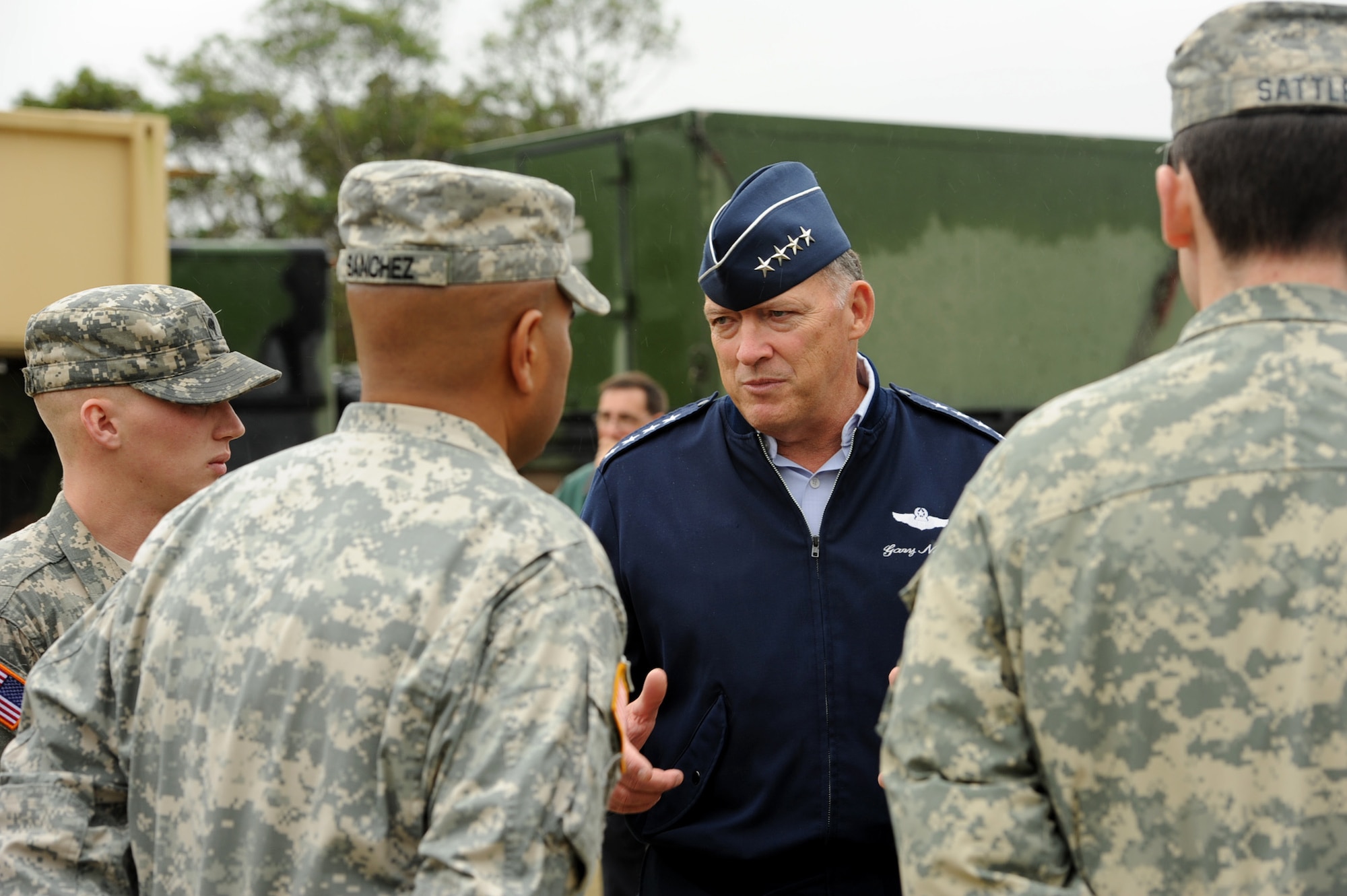 U.S. Air Force Gen. Gary North, Pacific Air Forces commander, speaks with members of the U.S Army's 1st Battalion 1st Air Defense Artillery (regiment) during his visit to Kadena Air Base, Japan, Jan. 9, 2012. During his time at Kadena, North expressed his gratitude to all the service members stationed here for their outstanding support of global missions and operations. (U.S. Air Force photo by Senior Airman Jarvie Z. Wallace/Released)
