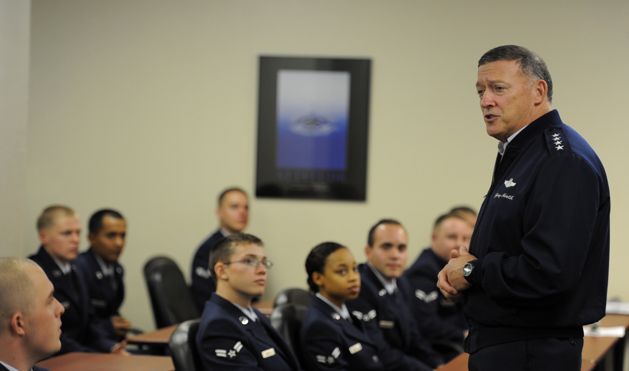 U.S. Air Force Gen. Gary North, Pacific Air Forces commander, speaks with members of the First Term Airman Center during his visit to Kadena Air Base, Japan, Jan. 9, 2012. During his time at Kadena, North expressed his gratitude to all the Airmen stationed here for their outstanding support of global missions and operations. (U.S. Air Force photo by Senior Airman Jarvie Z. Wallace/Released)
