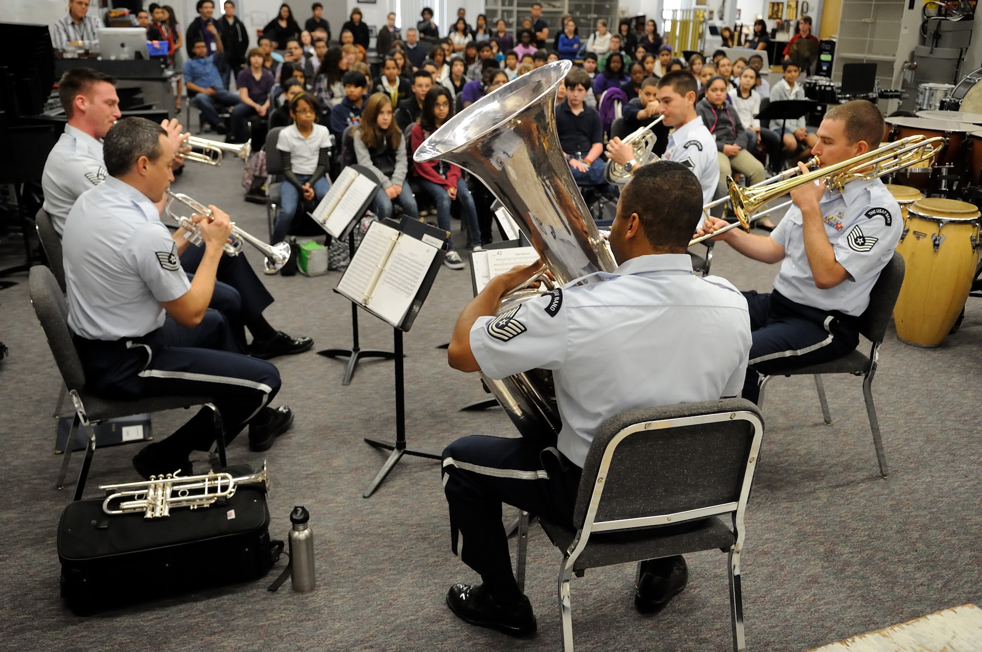 Members of the U.S. Air Force Band Ceremonial Brass Quintet play during a clinic at the Osceola County School for the Arts in Kissimmee, Fla., Jan. 18, 2012. The U.S. Air Force Band conducts the education outreach programs to teach middle and high school students about the importance of life skills such as discipline, teamwork and perseverence. U.S. Air Force photo by Master Sgt. Adam M. Stump/RELEASED.