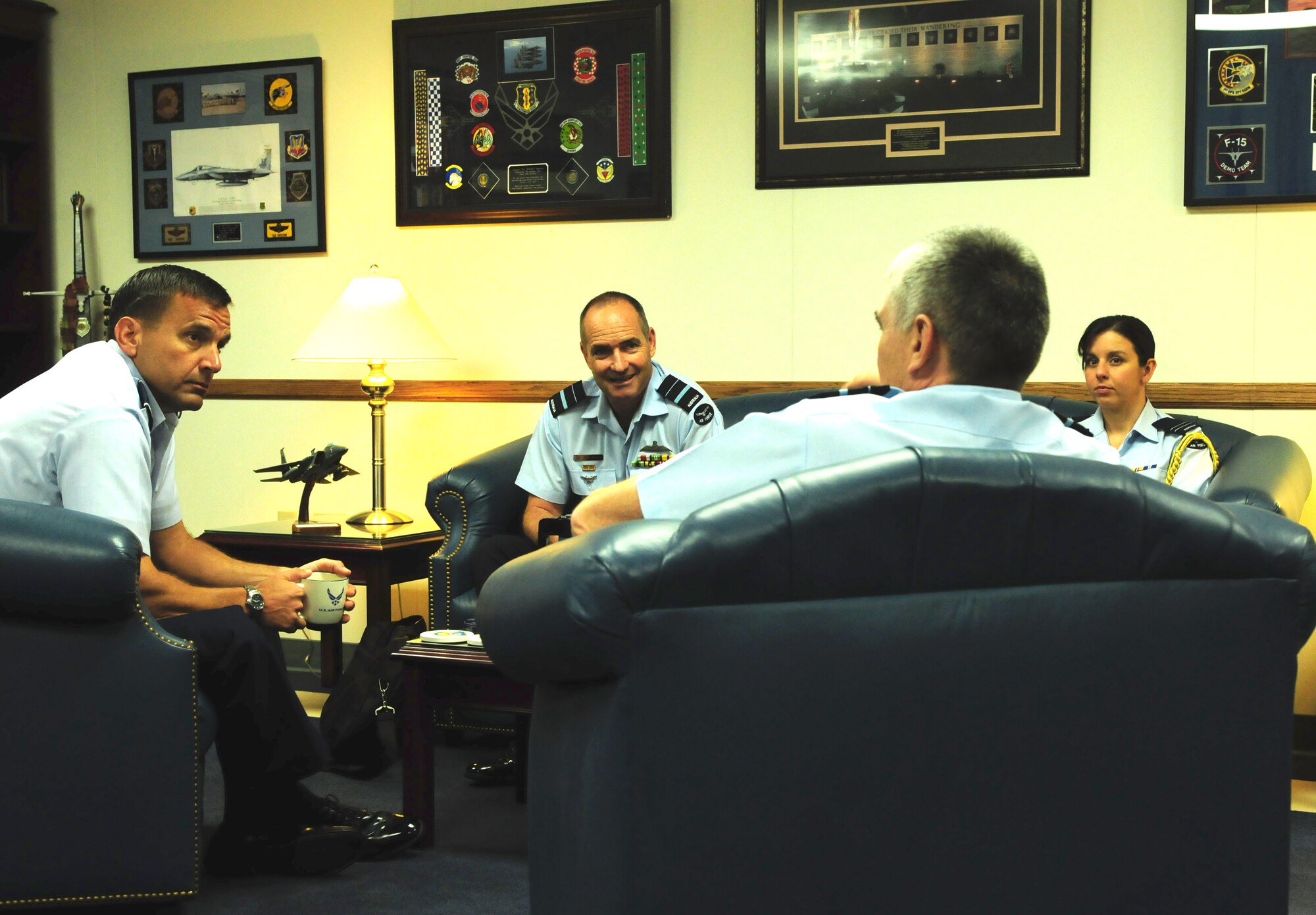 Lt. Gen. Ted Kresge, 13th Air Force Commander (left) and members of the Australian Royal Air Force listen as outgoing Air Commander Australia, Air Vice Marshal Mark Skidmore, speaks during his visit on Jan. 18, 2012, for high-level discussions on the US-Australian military alliance. (U.S. Air Force photo/Technical Sgt. Aries D. Early)
