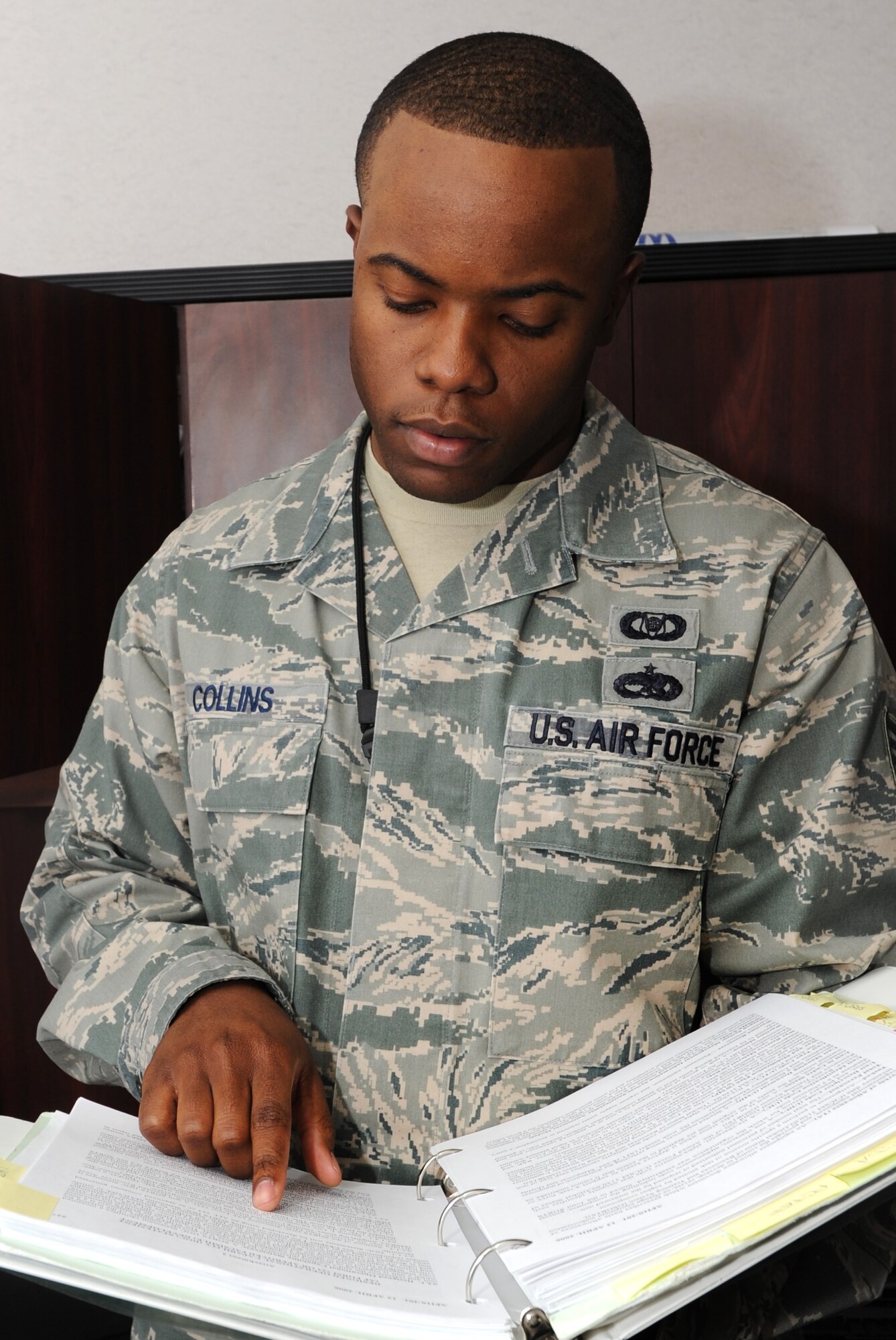 Tech. Sgt. Brian Collins, 22nd Air Refueling Wing Command Post status of resources and training systems and reports NCO in charge, reviews the SORTS Air Force Instruction prior to upcoming changes Jan. 18, 2012, McConnell Air Force Base, Kan. Collins establishes procedures for operational, readiness and SORTS reports for the wing. (U.S. Air Force photo/ Airman 1st Class Laura L. Valentine)