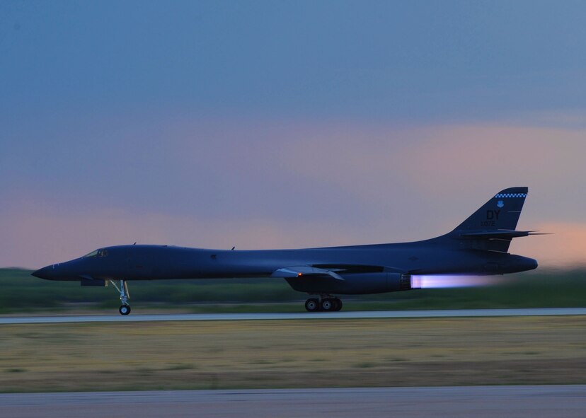 A U.S. Air Force B-1 Bomber takes off at dusk, Sept. 28, 2011, at Dyess Air Force Base, Texas. Switching aircraft from two sorties per day to a single sortie cut time wasted in minor maintenance, and scrubbing sorties delayed by more than two hours keeps later sorties from being postponed. (U.S. Air Force photo by Airman 1st Class Cierra Bullock/Released)