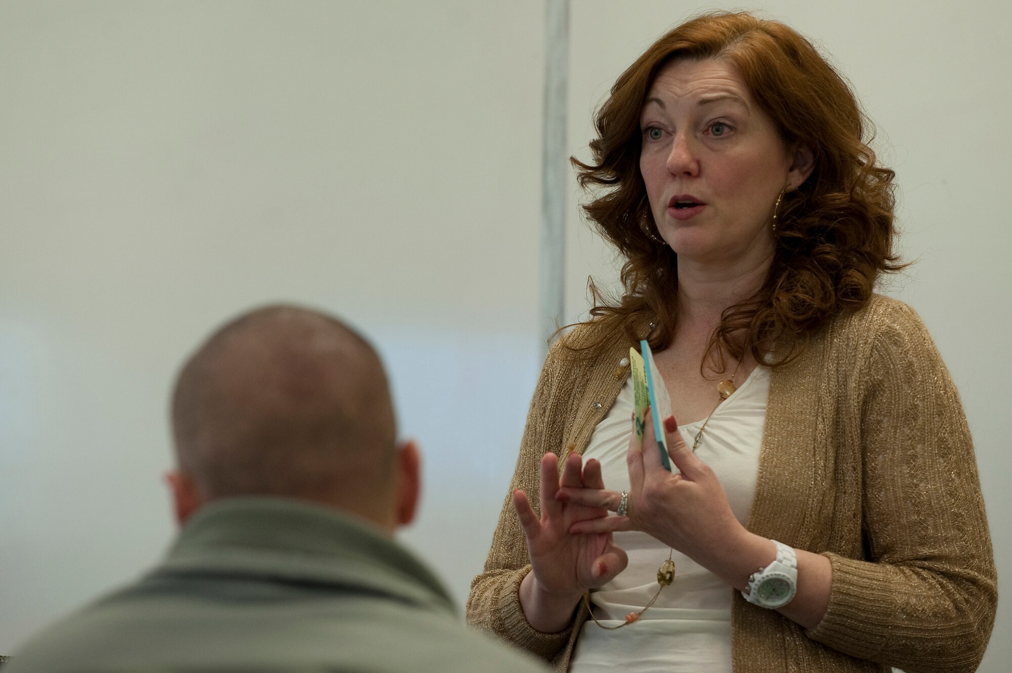 Lisa Surette, 99th Air Base Wing sexual assault response coordinator, trains Airmen during a Bystander Intervention Training course Jan. 17, 2012, at Nellis Air Force Base, Nev. Airmen are required to complete the course by June 2012. (U.S. Air Force photo by Staff Sgt. Christopher Hubenthal/Released)