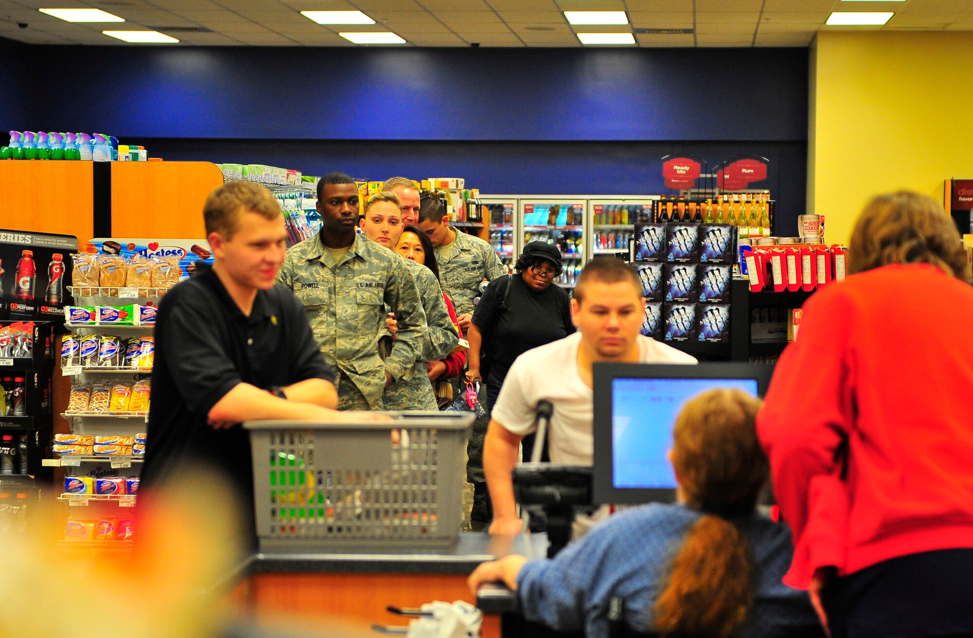 Customers wait in line at the recently renovated shoppette and customer service area at Shaw Air Force Base, S.C. Jan. 17, 2011. Approximately $400,000 of renovations were completed to accomodate the growing population of Shaw, resulting in faster service and a greater capacity for goods.  (U.S. Air Force photo/Senior Airman Neil D. Warner/Released)