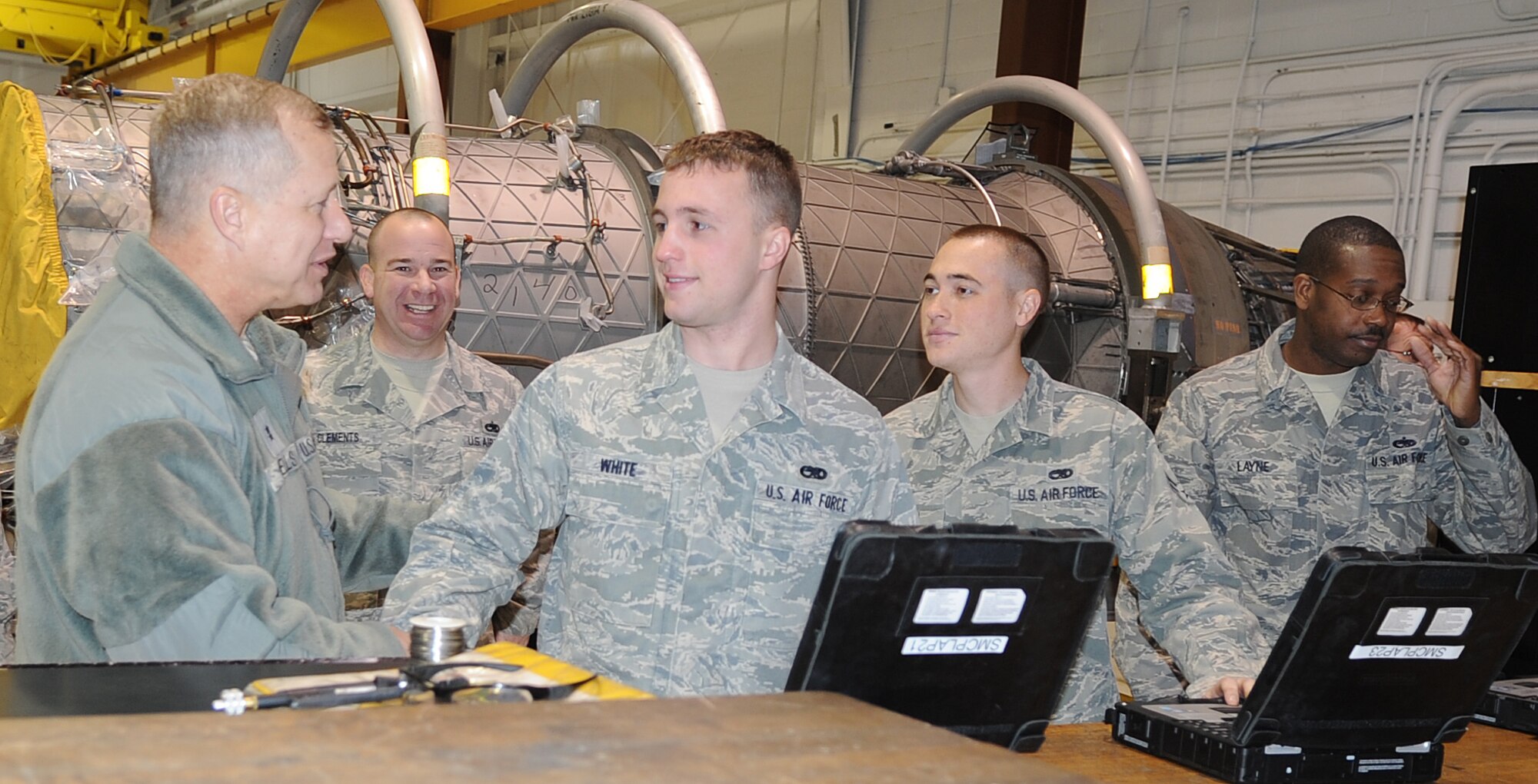 Maj. Gen. Lawrence Wells talks to Airmen from the 4th Component Maintenance Squadron propulsion flight, during his tour on Seymour Johnson Air Force Base, N.C., Jan. 13, 2012. Wells visited various shops on base to get a feel for how 4th Fighter Wing Airmen conduct their day-to-day operations. Wells is the 9th Air Force commander. (U.S. Air Force photo/Senior Airman Gino Reyes)