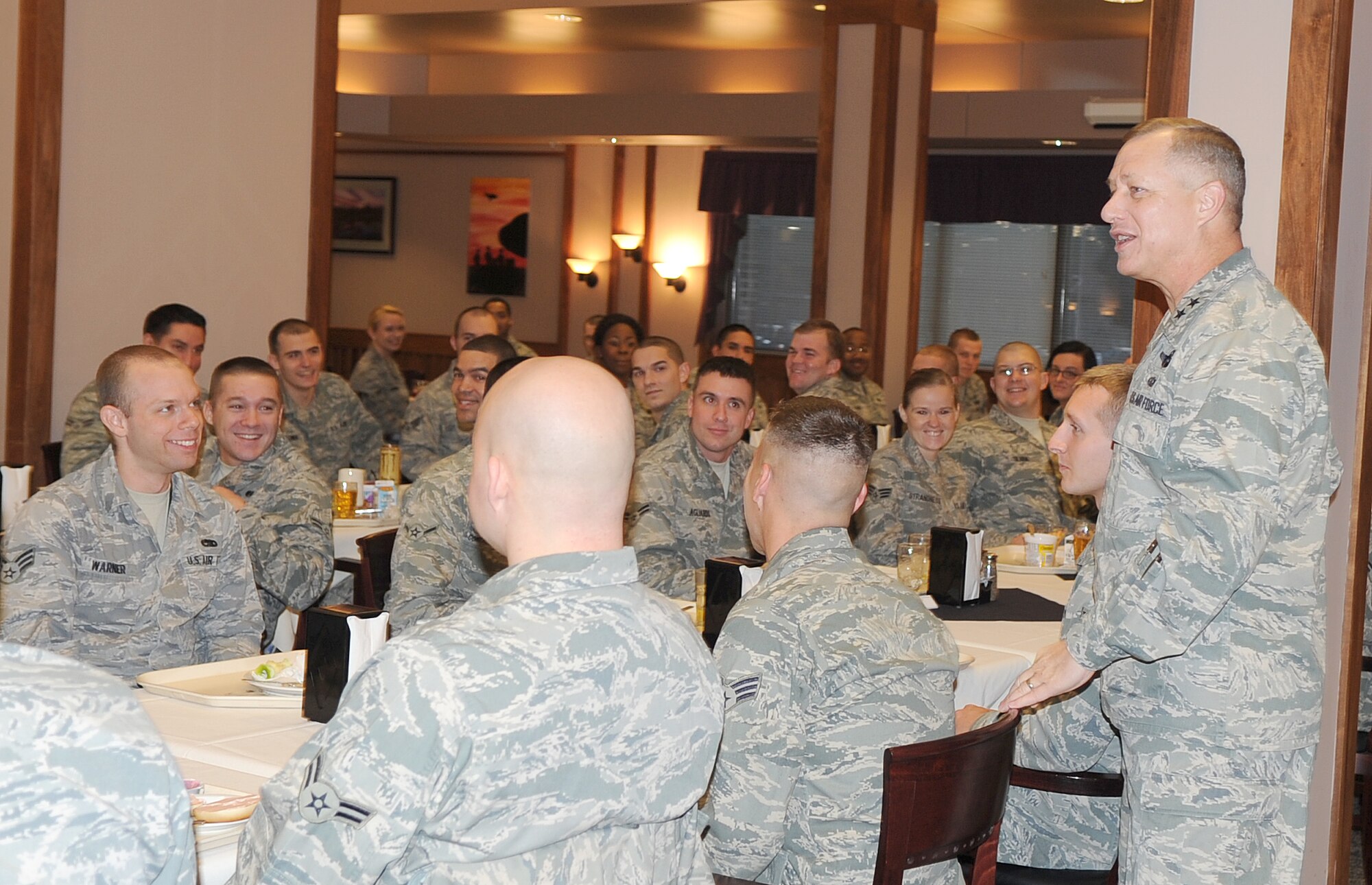 Maj. Gen. Lawrence Wells talks with 4th Fighter Wing Airmen during breakfast at the Southern Eagles Dining Facility on Seymour Johnson Air Force Base, N.C., Jan. 13, 2012. During the breakfast Wells encouraged the Airmen to ask any questions they had about the Air Force. This was his first visit to the base since he assumed command of the 9th Air Force in Oct. 2011. (U.S. Air Force photo/Senior Airman Gino Reyes)