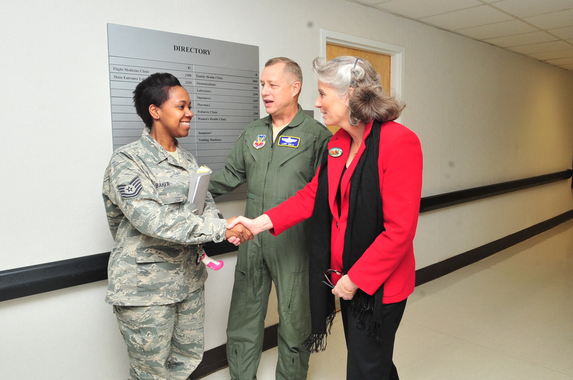 Maj. Gen. Lawrence Wells and his wife Kathy greet Tech. Sgt. Angela Baker while touring the 4th Medical Group campus at Seymour Johnson Air Force Base, N.C., Jan. 12, 2012. General and Mrs. Wells visited the base to learn the needs of the 4th Fighter Wing and to acknowledge Airmen for their outstanding performance during the past year. This was Wells’ first visit to Seymour Johnson since assuming command of the 9th Air Force in October 2011. Baker is a TRICARE technician with the 4th Medical Support Squadron who hails from Norfolk, Va. (U.S. Air Force photo/Senior Airman Marissa Tucker)