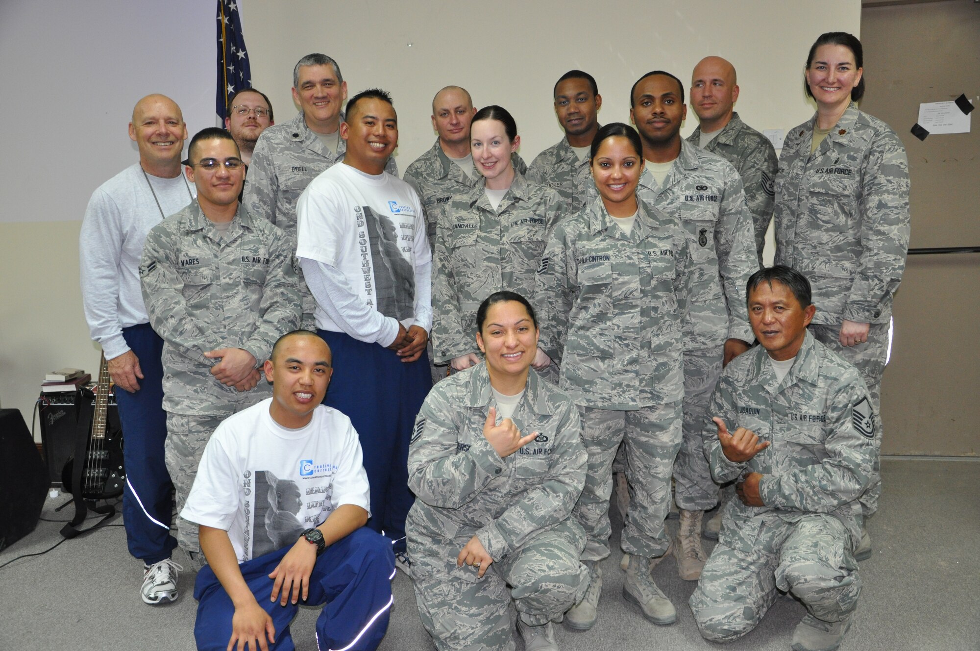 The chapel band poses for a group photo after performing at the Martin Luther King Jr. Day celebration at the base chapel in an undisclosed location in Southwest Asia Jan 16, 2012. The purpose of the celebration was to spread Reverend King’s message of equality and promote diversity. (photo by Senior Airman Melanie Holochwost) 