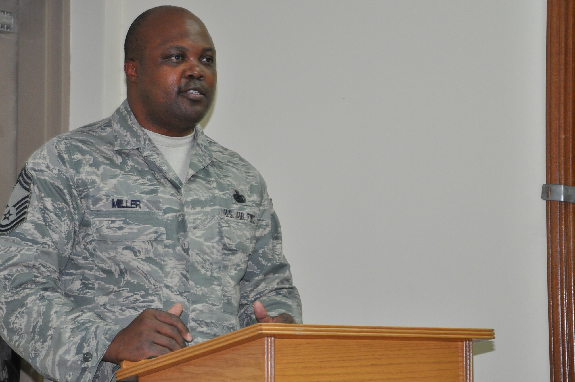 Chief Master Sgt. Brian Miller, 332nd Expeditionary Logistic Readiness Squadron, delivers a speech Jan. 16, 2012 during the Martin Luther King Jr. Day celebration at an undisclosed location in Southwest Asia. Miller is currently taking a class on Dr. King, so he used this opportunity to share what he has learned with base personnel. Miller is deployed from Moody Air Force Base, Ga. (photo by Senior Airman Melanie Holochwost)