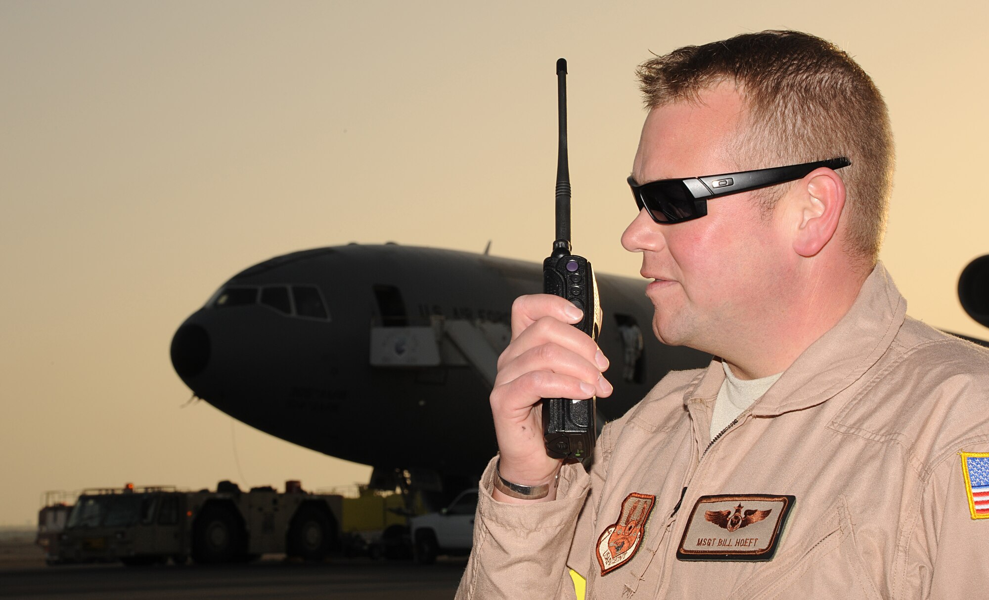 SOUTHWEST ASIA - Master Sgt. Bill Hoeft coordinates an exercise for Airmen from the 380th Air Expeditionary Wing, including firefighters, security forces, medical teams and several other units Jan. 18, 2012.  For the major accident response exercise scenario, Hoeft and his team of evaluators assessed how 380th AEW Airmen would respond in case a KC-10 Extender aircraft crashed on the runway.  Hoeft, the wing plans and programs superintendent, is assigned to the 380th AEW and is deployed from Travis Air Force Base, Calif. (U.S. Air Force photo/Tech. Sgt. Arian Nead)
