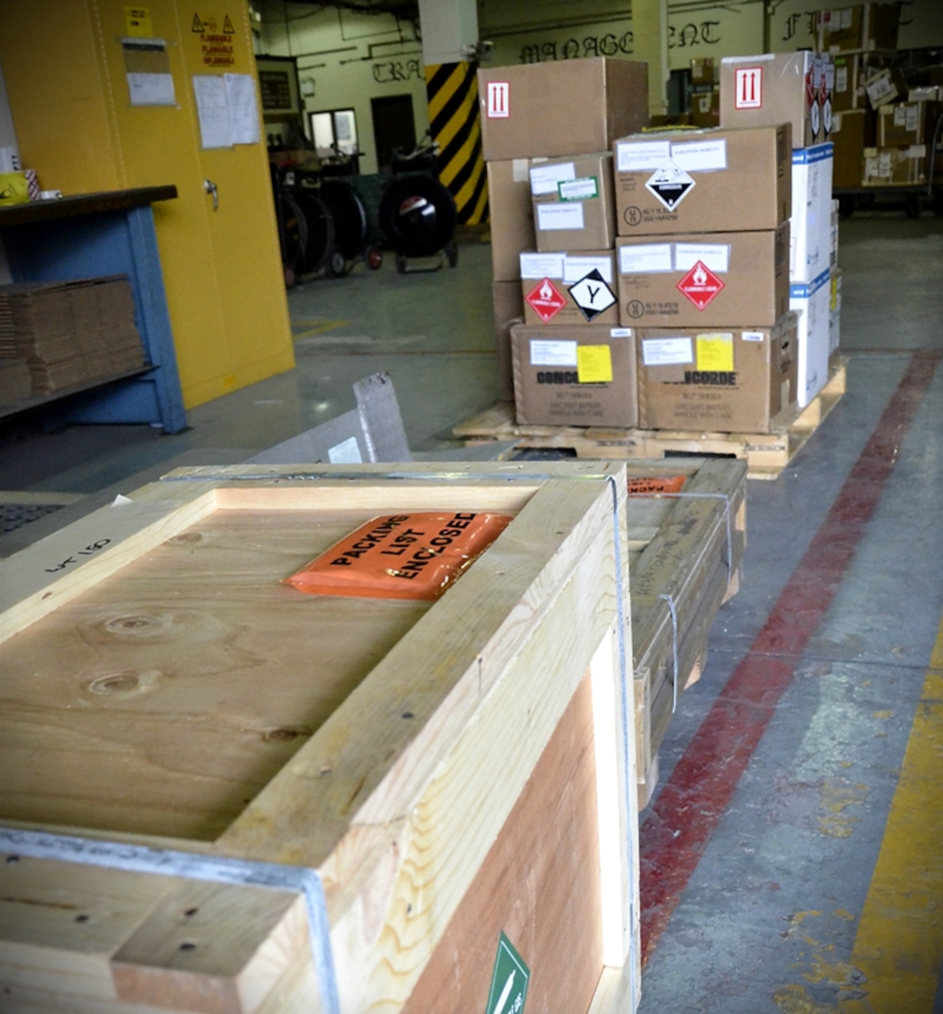The traffic management flight from the 8th Logistics Readiness Squadron ensures boxes, packages and cargo of all kinds are properly classified and labeled according to class prior to shipment at Kunsan Air Base, Republic of Korea, Jan. 10, 2012. The traffic management flight has three distinct sections that routinely perform above and beyond, putting bread and bullets in the hands of the Wolf Pack. (U.S. Air Force photo by Senior Airman Benjamin Stratton/Released)