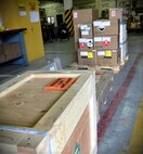 The traffic management flight from the 8th Logistics Readiness Squadron ensures boxes, packages and cargo of all kinds are properly classified and labeled according to class prior to shipment at Kunsan Air Base, Republic of Korea, Jan. 10, 2012. The traffic management flight has three distinct sections that routinely perform above and beyond, putting bread and bullets in the hands of the Wolf Pack. (U.S. Air Force photo by Senior Airman Benjamin Stratton/Released)