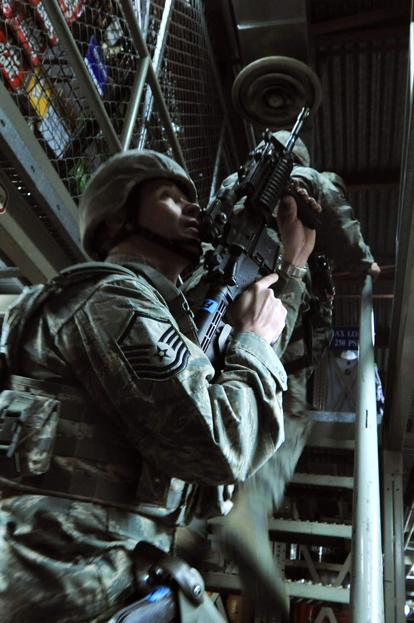 Members of the 8th Security Forces Squadron respond to an active shooter during a Pacific Air Forces High Risk Response Training at Kunsan Air Base, Republic of Korea, Jan. 13, 2012. A goal of the program is to aid law enforcement officers in their ability to safely and effectively respond to, address and stop an active shooter. (U.S. Air Force photo by Senior Airman Brittany Y. Auld/Released)