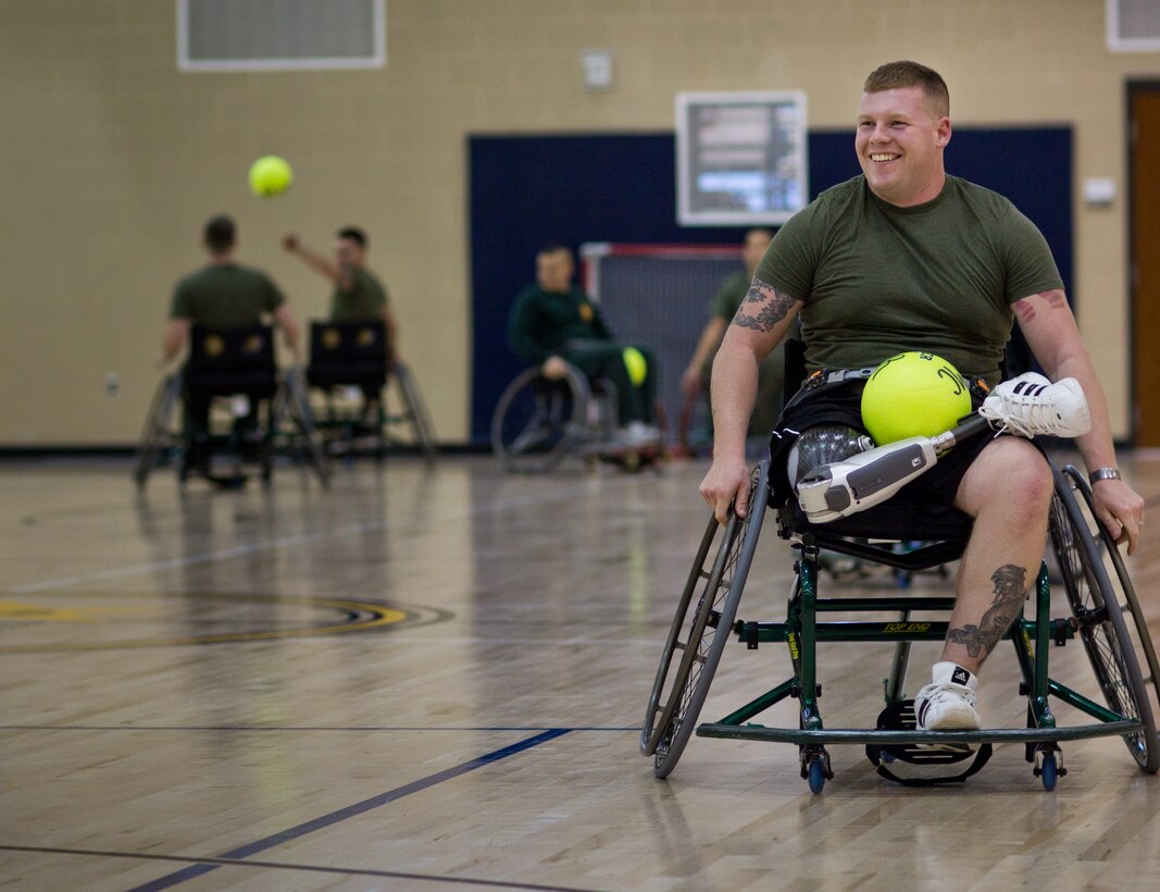 Cpl. Rory Hamill, who was injured in Afghanistan, spins around during an improvised wheelchair soccer game at the Walter Reed National Military Medical Center Bethesda, Md., Jan. 10. Hamill is one of 17 Marines who recently graduated from the first corporals course for the Wounded Warrior Detachment.