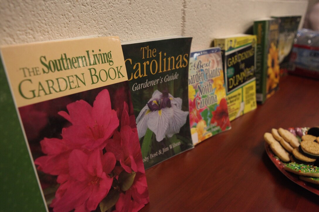 Gardening books were displayed on the table during the Gardening 101 workshop hosted by the Harriotte B. Smith Library aboard Marine Corps Base Camp Lejeune, Jan. 19. Approximately 24 service members and patrons attended the class taught by Lisa Rayburn, a teacher with North Carolina Cooperative Extension Service, North Carolina State University.