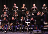 Chief Warrent Officer 4 Jim Ford, ocuppational field sponser, Marine Corps Music Program, conducts a musical piece for the Marine Corps All-Star Jazz band as they perform at the Long Center for the Performing Arts, Lafayette, Ind., Jan. 19. The band participated in the Purdue Jazz Festival during their tour of the Midwest.