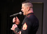 Staff Sgt. Ken Ebo, trombone instriuctor, The School of Music, Little Creek, Va., adds vocals to the Marine Corps All-Star Jazz Bands performances at the Long Center, Lafayette, Ind., Jan. 19. The band performed at the Purdue Jazz Festival during their tour of the Midwest.