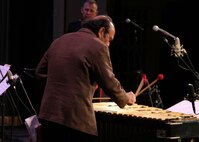 Dick Sisto, artist-in-residence, Long Center for the Performing Arts, Lafayette, Ind., performs with the Marine Corps All-Star Jazz Band during the Purdue Jazz Festival Jan. 19. The band performed at the festival during their tour of the Midwest.