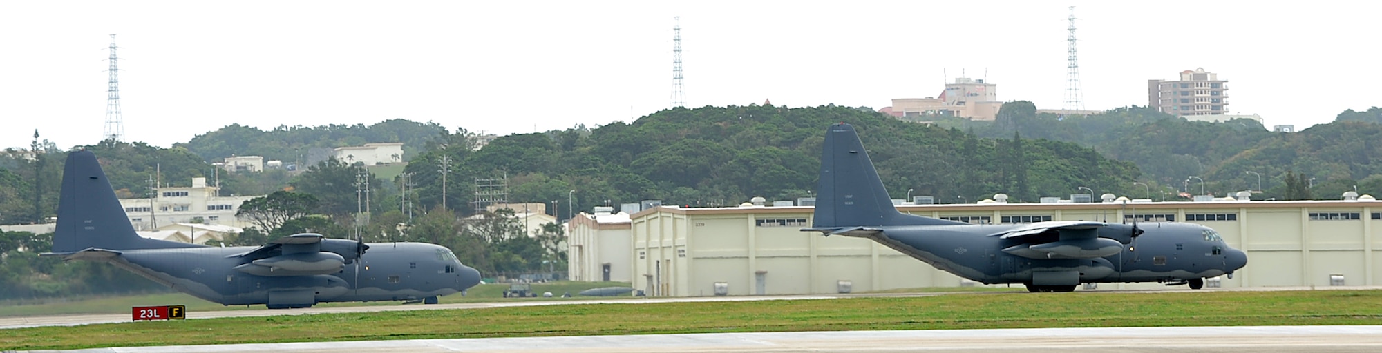 A group of U.S. Air Force MC-130P Combat Shadow special operations aircraft from the 17th Special Operations Squadron prepare for a training flight on the flight line of Kadena Air Base, Japan, Jan. 19, 2012. The Combat Shadow flies clandestine, or low visibility, single or multi-ship low-level air refueling missions for special operations helicopters, and infiltration, exfiltration, and resupply of special operations forces by airdrop or airland intruding politically sensitive or hostile territories. (U.S. Air Force photo by Airman 1st Class Brooke P. Beers/Released)