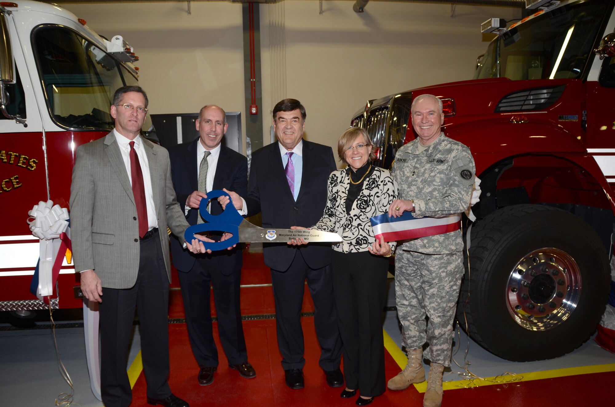 (L-R) Executive Vice President of Milestone Construction, Mr. Bill Colonna, Principal/New Jersey Regional Manager Mr. Martin Durney, C.A. Dutch Ruppersberger, United States House of Representative for Maryland’s 2nd District, Barbara Nemcheck, Project Manager both from Burns and McDonnell Inc. and Major General James A. Adkins, adjutant general for the Maryland National Guard cut the ribbon for the new 21,000-square-foot state-of-the-art 175th Crash Fire Rescue Station at Maryland Air National Guard in Baltimore Maryland. (National Guard photo by Master Sgt. Ed Bard/RELEASED)