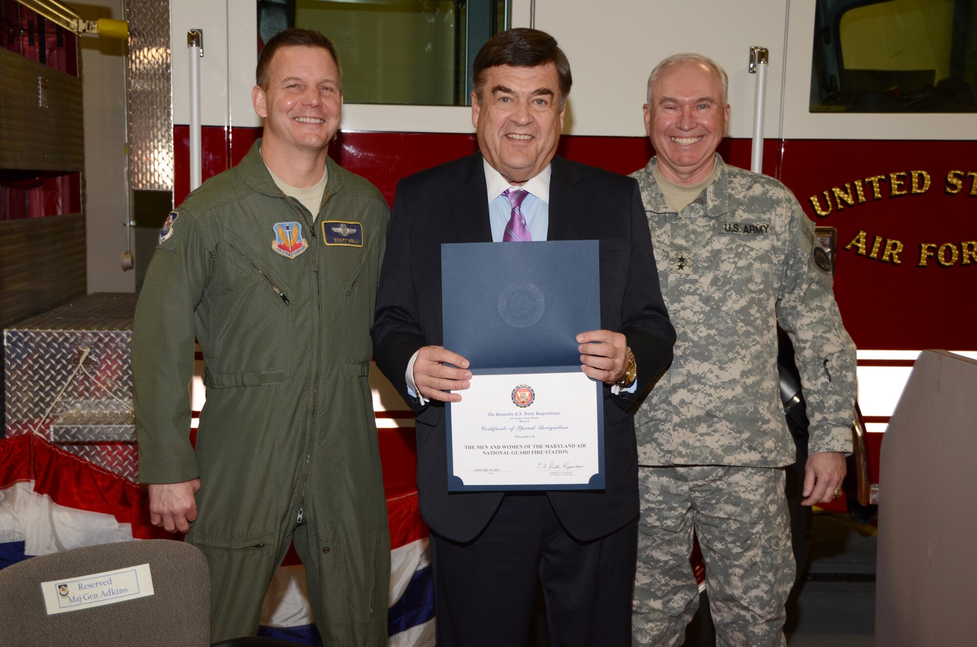 C.A. Dutch Ruppersberger, (center) United States House of Representative for Maryland’s 2nd District, presents a Certificate of Special Recognition to the Men and Women of the Maryland National Guard Fire Station during the ribbon cutting ceremony on January 19, 2012 at the new 21,000-square-foot state-of-the-art 175th Crash Fire Rescue Station at Maryland Air National Guard in Baltimore Maryland. Accepting the certificate is Colonel Scott L. Kelly (left) base commander and Major General James A. Adkins, adjutant general for the Maryland National Guard. (right) (National Guard photo by Master Sgt. Ed Bard/RELEASED) 