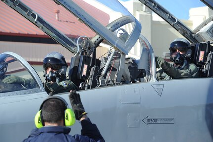 Col. Tom Murphy, 47th Flying Training Wing commander, and Lt. Col. Steve Plank, 434th Fighter Training Squadron director of operations, prepare to exit the T-38C Talon they delivered from Laughlin AFB, Texas to Randolph AFB, Jan. 18, 2012.  The jet is the last of 20 jets to be transferred to the 435th Fighter Training Squadron at Randolph from the 434th FTS at Laughlin as part of the consolidation of the Introduction to Figher Fundamentals training course. Due to the consolidation, the 435th FTS will also gain 11 active duty instructor pilots, more than 30 support positions, and 80 additional students annually. 