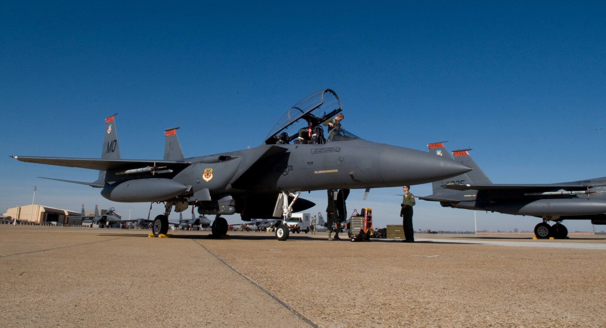 Aircrew from the 391st Fighter Squadron exit an F-15E Strike Eagle on the flight line of Barksdale Air Force Base, La., Jan. 18. The 391 FS, from Mountain Home Air Force Base, Idaho, is at Barksdale to participate in Green Flag. The training helps Airmen and soldiers prepare for combat situations involving close air support.(U.S. Air Force photo/Airman 1st Class Benjamin Gonsier)(RELEASED)
