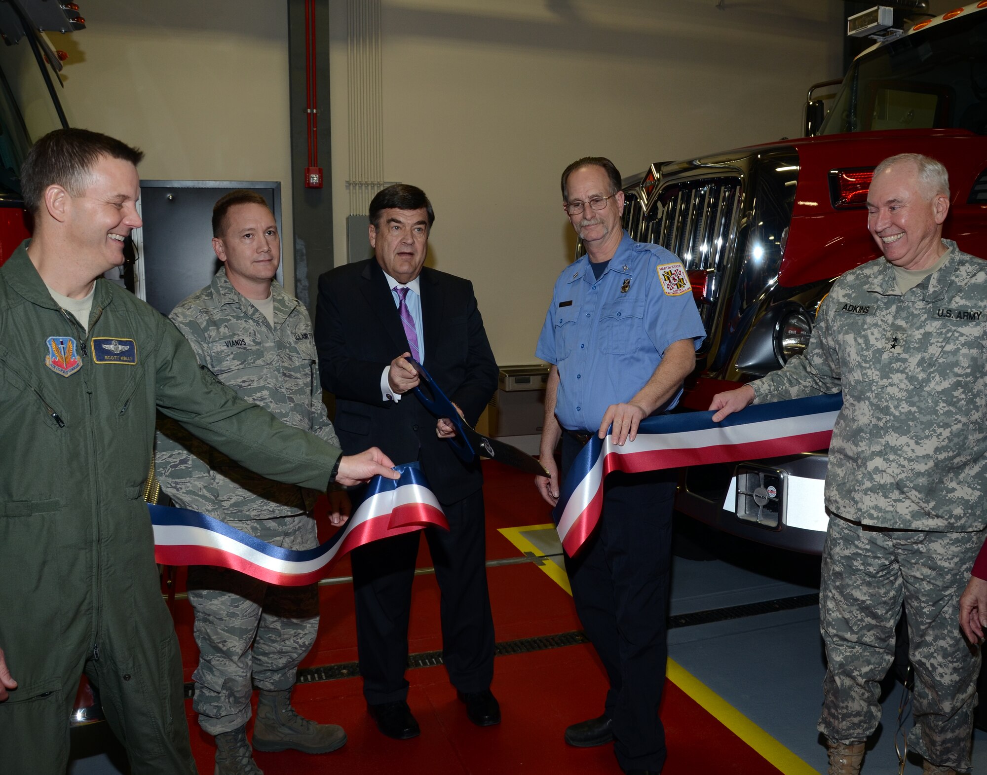 (L-R) Colonel Scott L. Kelly, base commander, Master Sgt. Wayne Viands, fire chief, Congressman C.A. Dutch Ruppersberger, U.S. House of Representative for Maryland’s 2nd District, Captain William R. Nickerson and Major General James A. Adkins, adjutant general for the Maryland National Guard cut the ribbon for the new 21,000-square-foot state-of-the-art 175th Crash Fire Rescue Station at Maryland Air National Guard in Baltimore Maryland.  (National Guard photo by Master Sgt. Ed Bard/RELEASED)  
 
