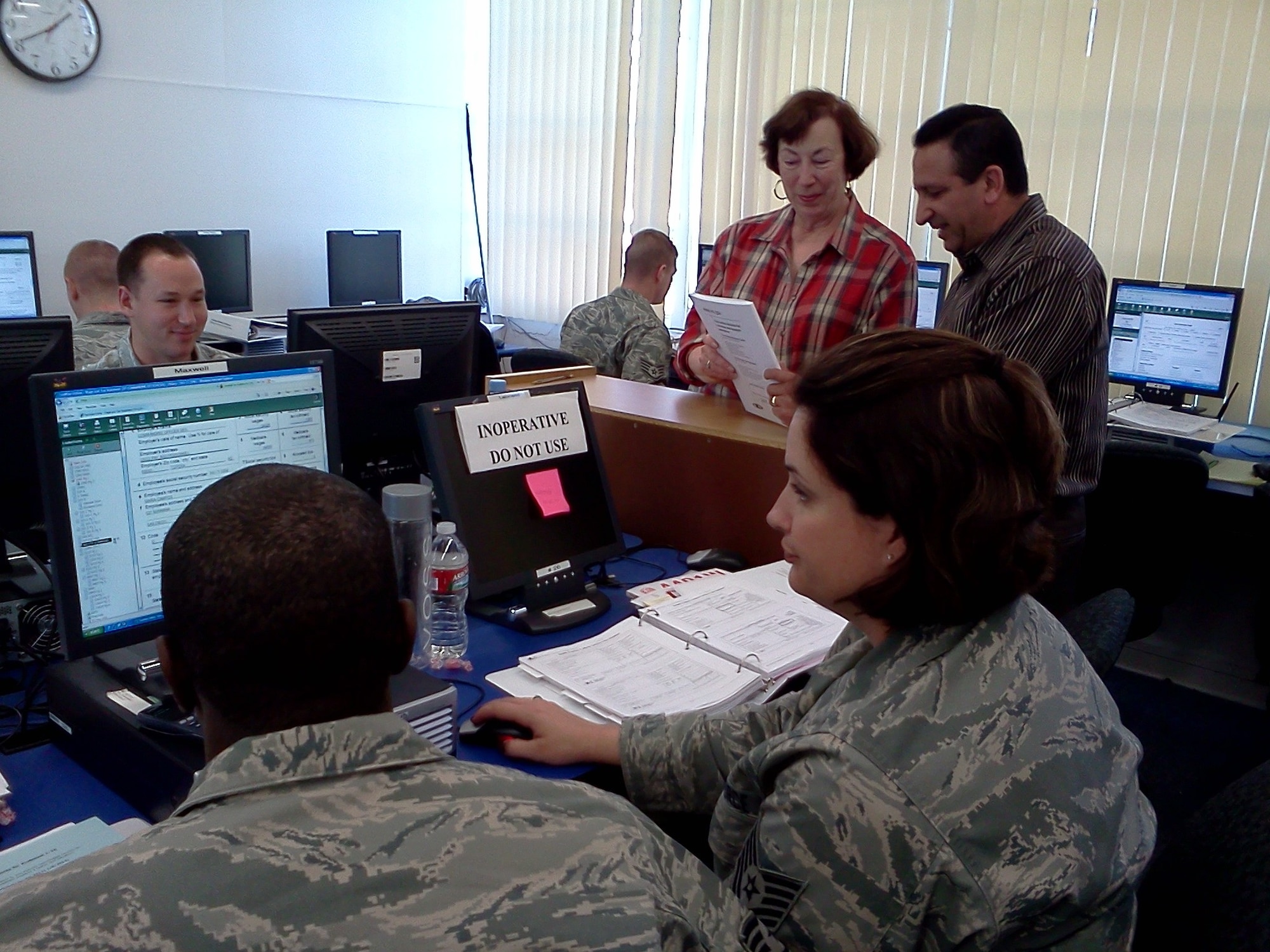 VANDENBERG AIR FORCE BASE, Calif. – Ernest Feliciano, a Franchise Tax Board military coordinator, and Ann Fox, the Vandenberg Tax Office coordinator, instruct a class of new Volunteer Income Tax Assistance representatives from Vandenberg at one of the Education Center’s computer labs here Wednesday, Jan. 19, 2012. VITA reps will help assist the Vandenberg Tax Office’s workload during tax season by providing free tax preparation services to all active-duty members, their dependents and retirees at the representatives’ place of work.  (U.S. Air Force photo/Senior Airman Steve Bauer)