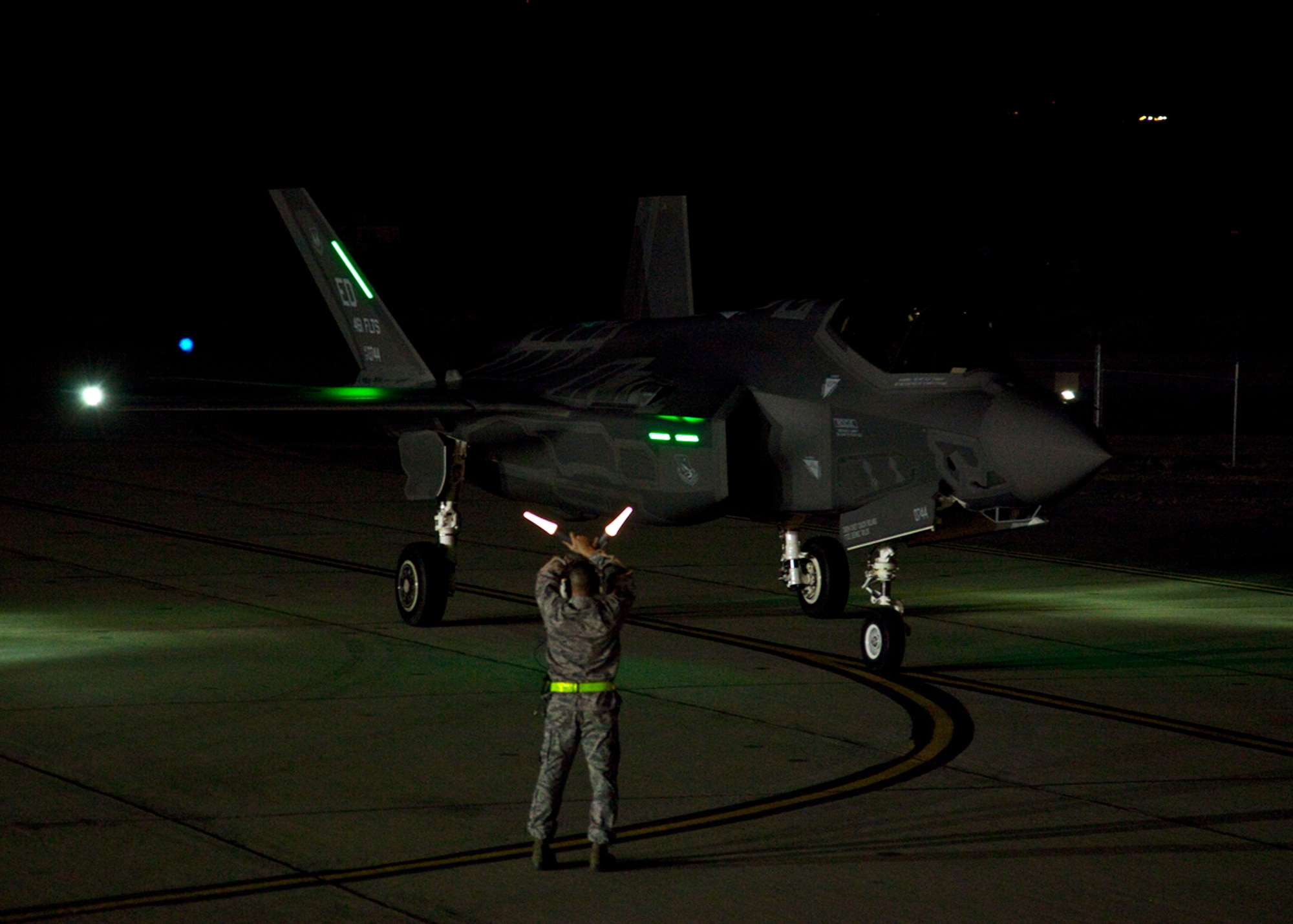 The first night flight in the history of the Lockheed Martin F-35 Program was completed Jan. 18 at Edwards Air Force Base, Calif.  The mission consisted of a series of straight-in approaches in twilight and darkness.  The pilot also performed an evaluation of the F-35's cockpit lighting which Ward called, "the best he's ever seen."  The testing will clear the way for night refueling and formation testing later this year.  (Lockheed Martin photo)  

 

(Lockheed Martin photos by Tom Reynolds and Darin Russell)

